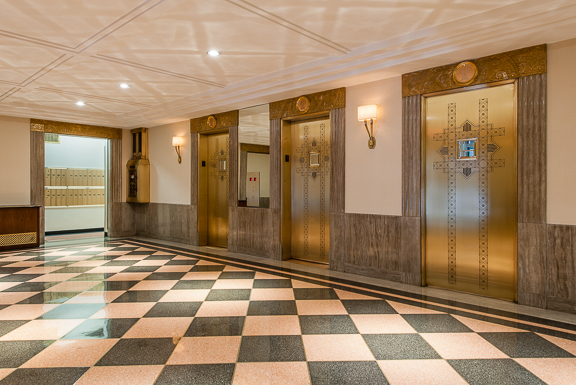 433 West 34th Street, Unit 8D Manhattan, NY 10001 - Photo 11 of 15 a view of a bathroom with a glass door shower and a bathtub