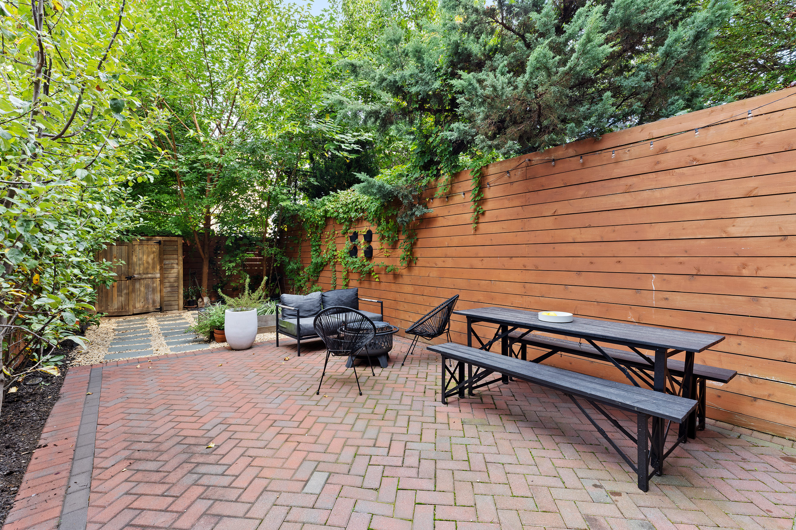 659 Degraw Street, Unit 1 Brooklyn, NY 11217 - Photo 8 of 10 a backyard of a house with seating space