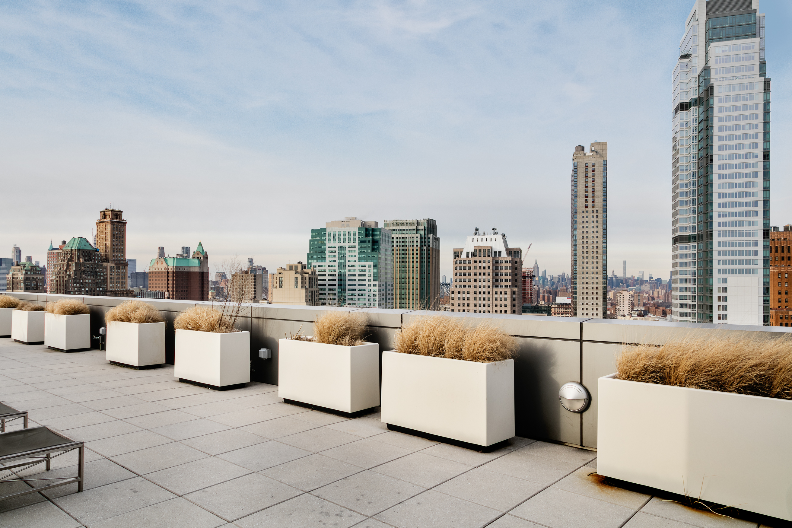 189 Schermerhorn Street, Unit 24D Brooklyn, NY 11201 - Photo 9 of 10 a living room with furniture and a large window