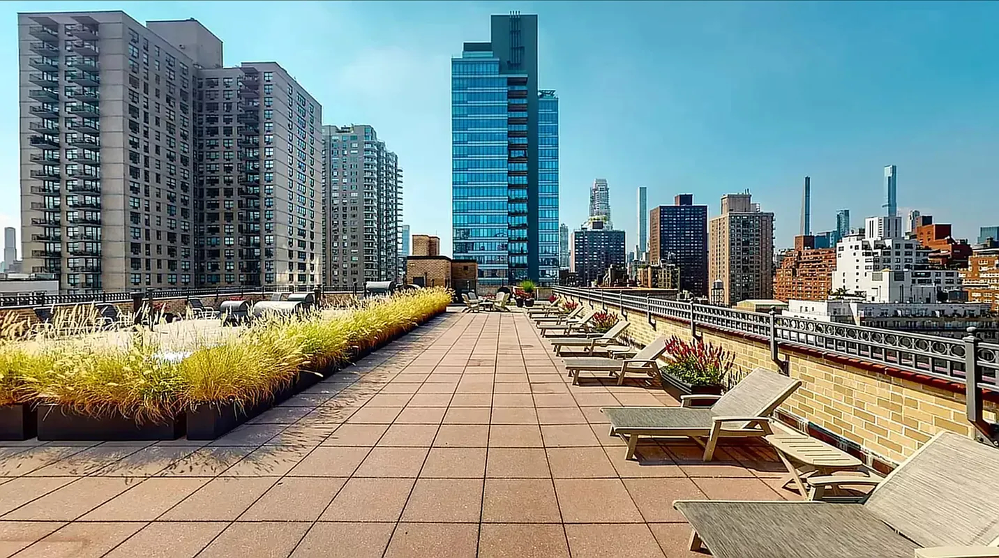 240 East 76th Street, Unit 2E Manhattan, NY 10021 - Photo 9 of 11 a view of swimming pool with chairs