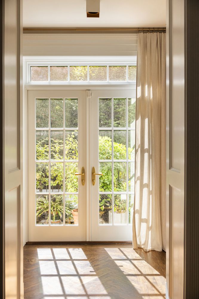 a view of empty room with windows