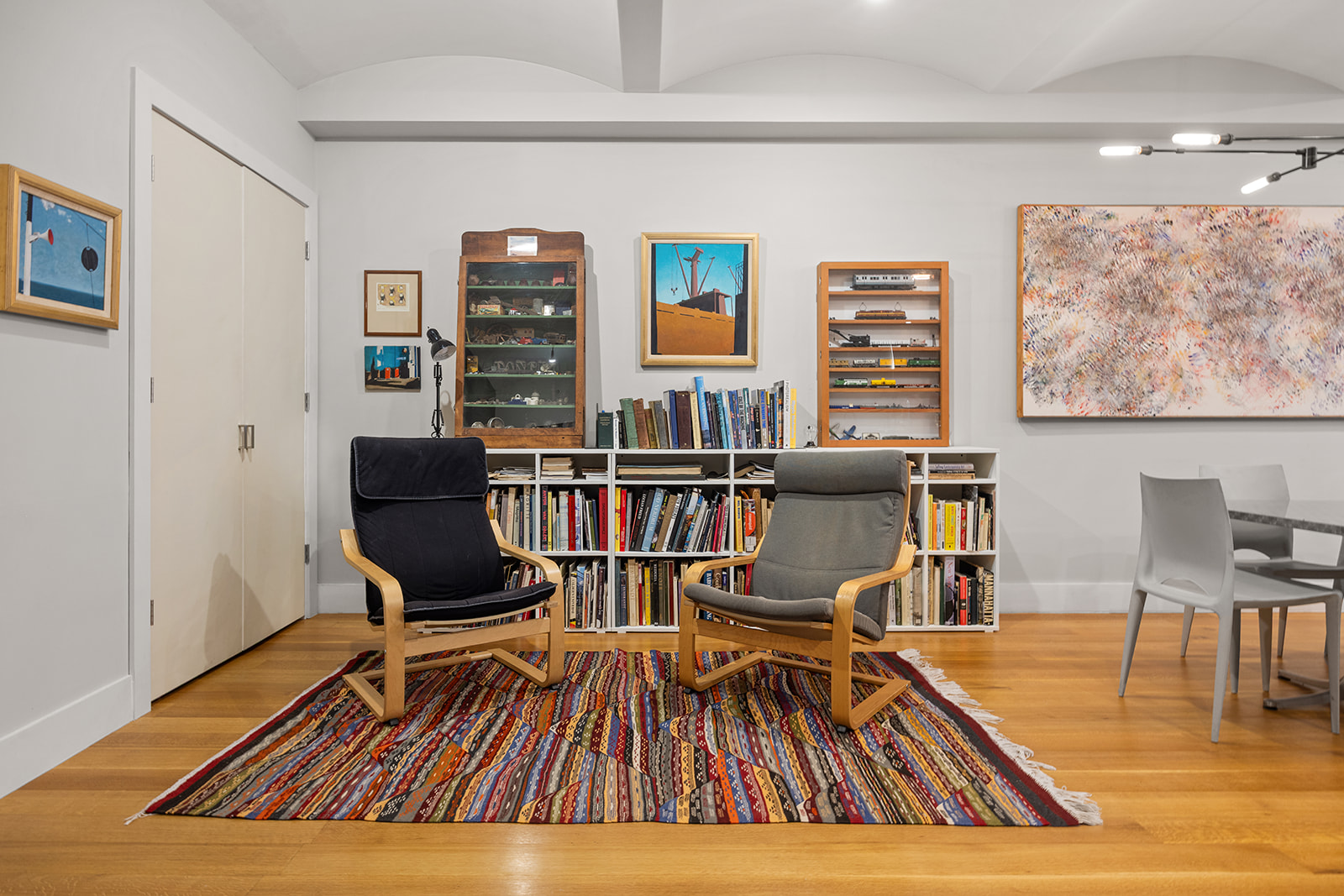 42 Ann Street, Unit 7 Manhattan, NY 10038 - Photo 7 of 16 a living room with furniture and wooden floor