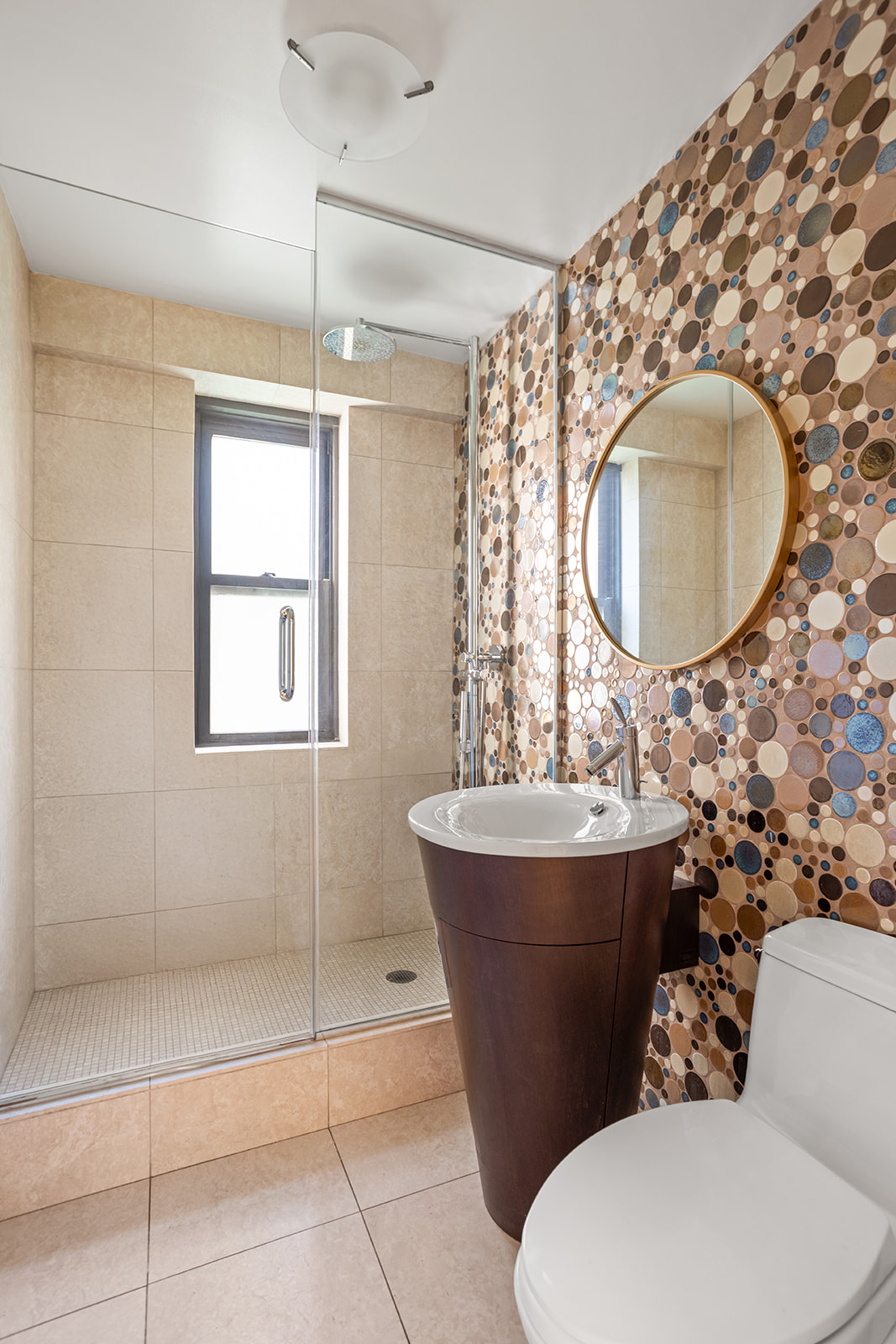 208 East Broadway, Unit J405/J406 Manhattan, NY 10002 - Photo 13 of 21 a bathroom with a toilet sink and mirror