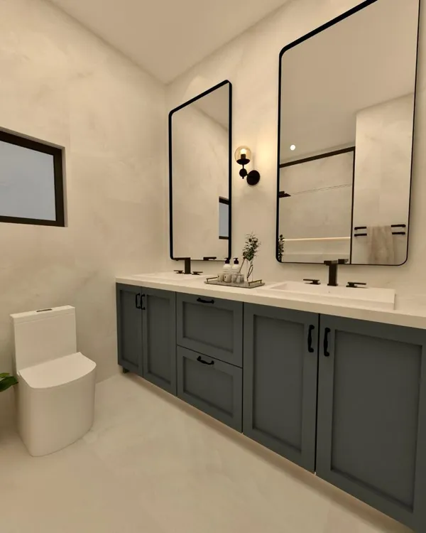 a bathroom with a double vanity sink toilet and mirror