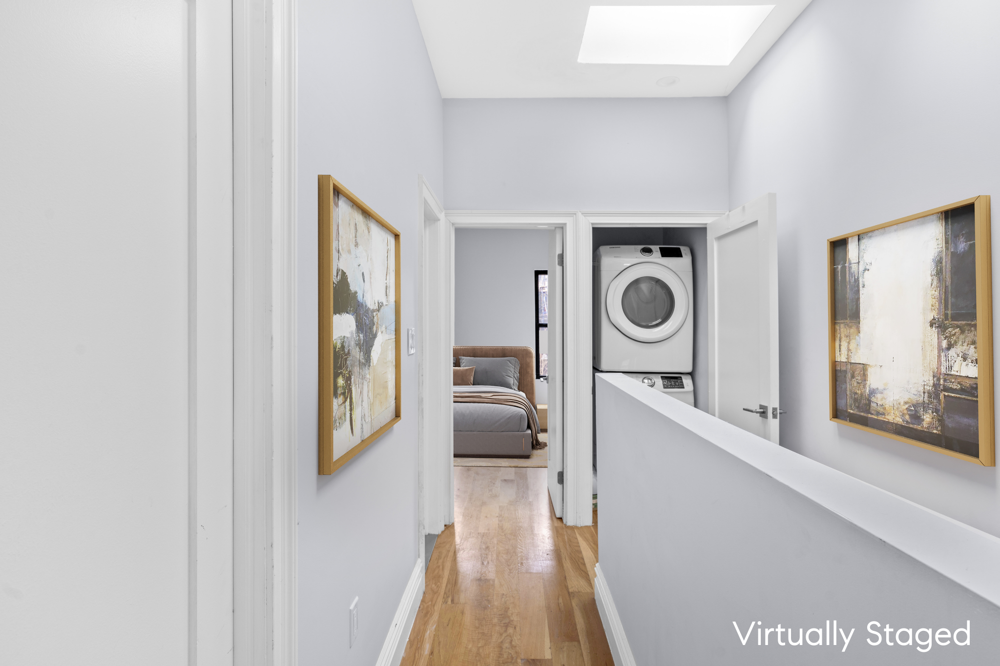 181 Park Avenue Brooklyn, NY 11205 - Photo 7 of 19 a view of a hallway with washer and dryer