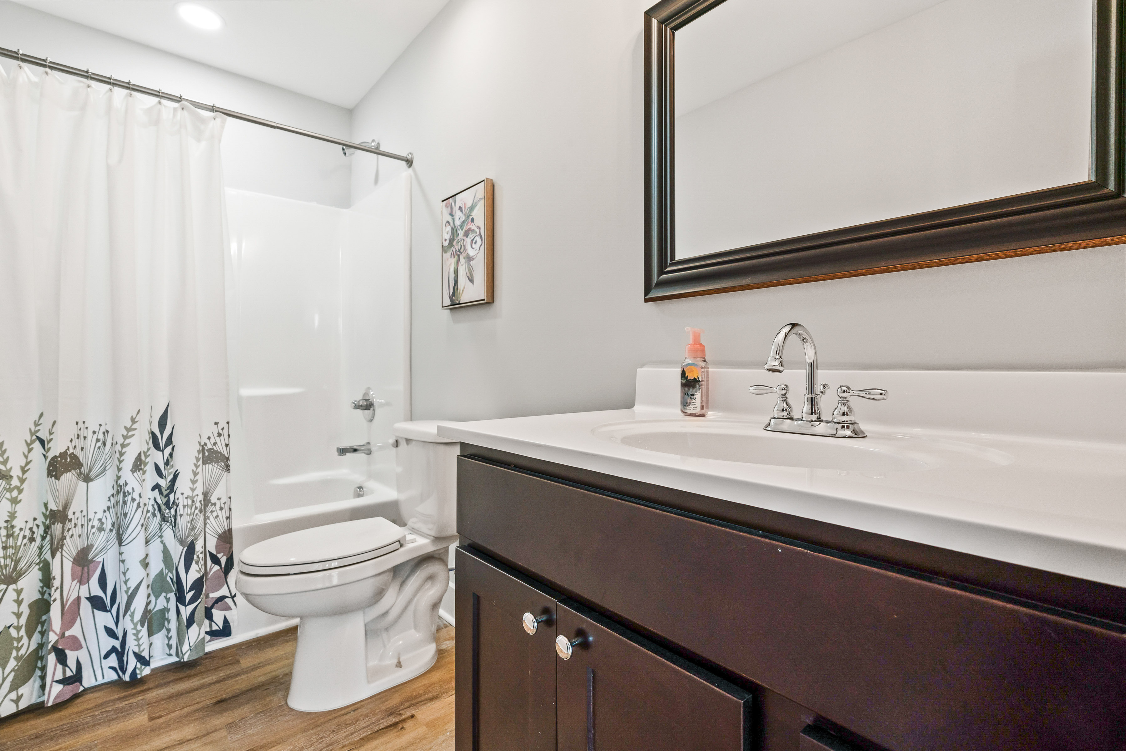 Happy Hollow Road Goodlettsville, TN 37072 - Photo 83 of 203 a bathroom with a sink a toilet and a mirror