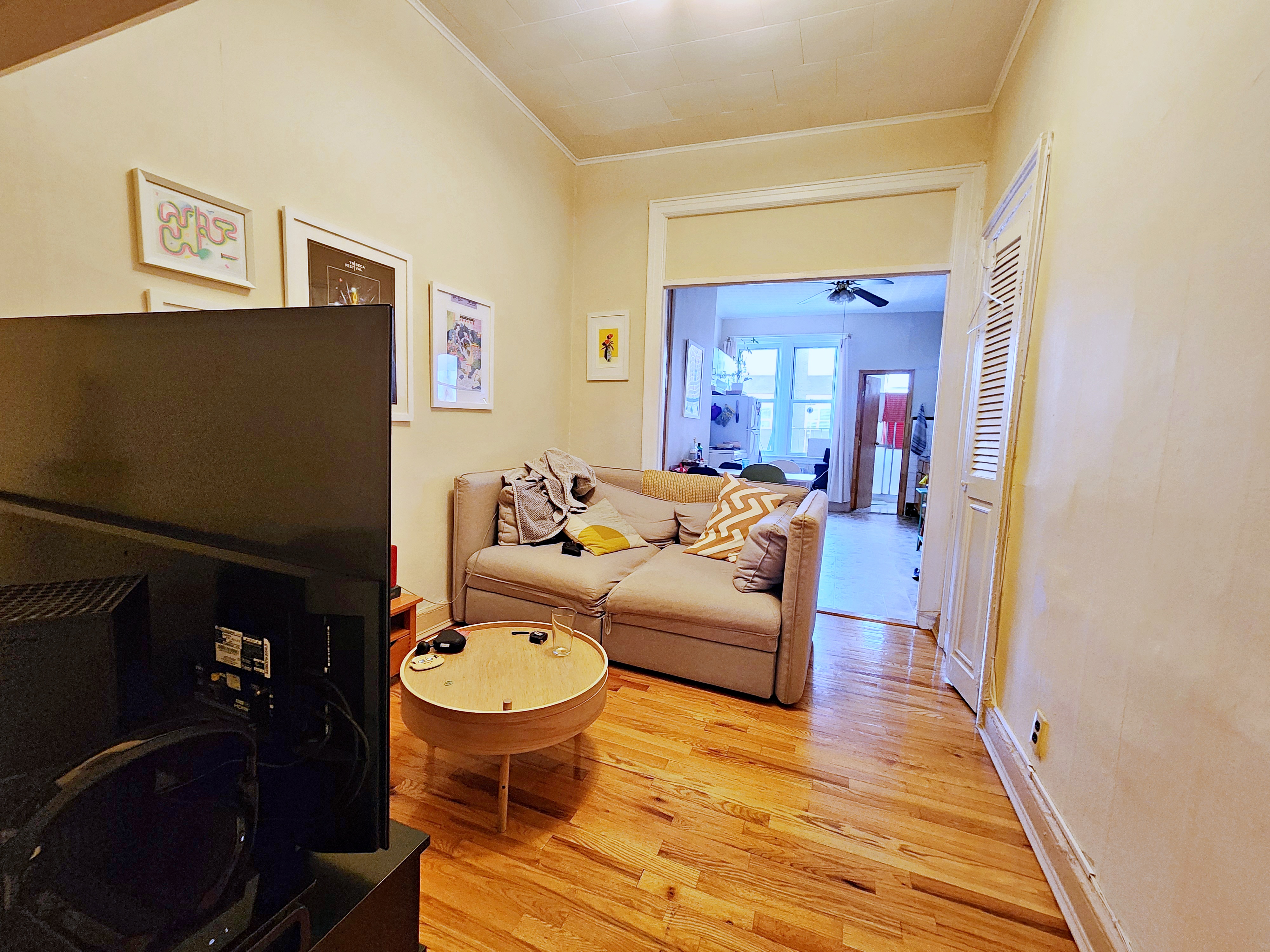 148 Withers Street, Unit 3L Brooklyn, NY 11211 - Photo 8 of 9 a living room with furniture and a wooden floor