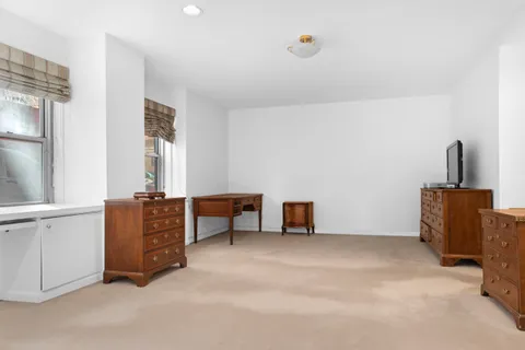 a room with furniture and window