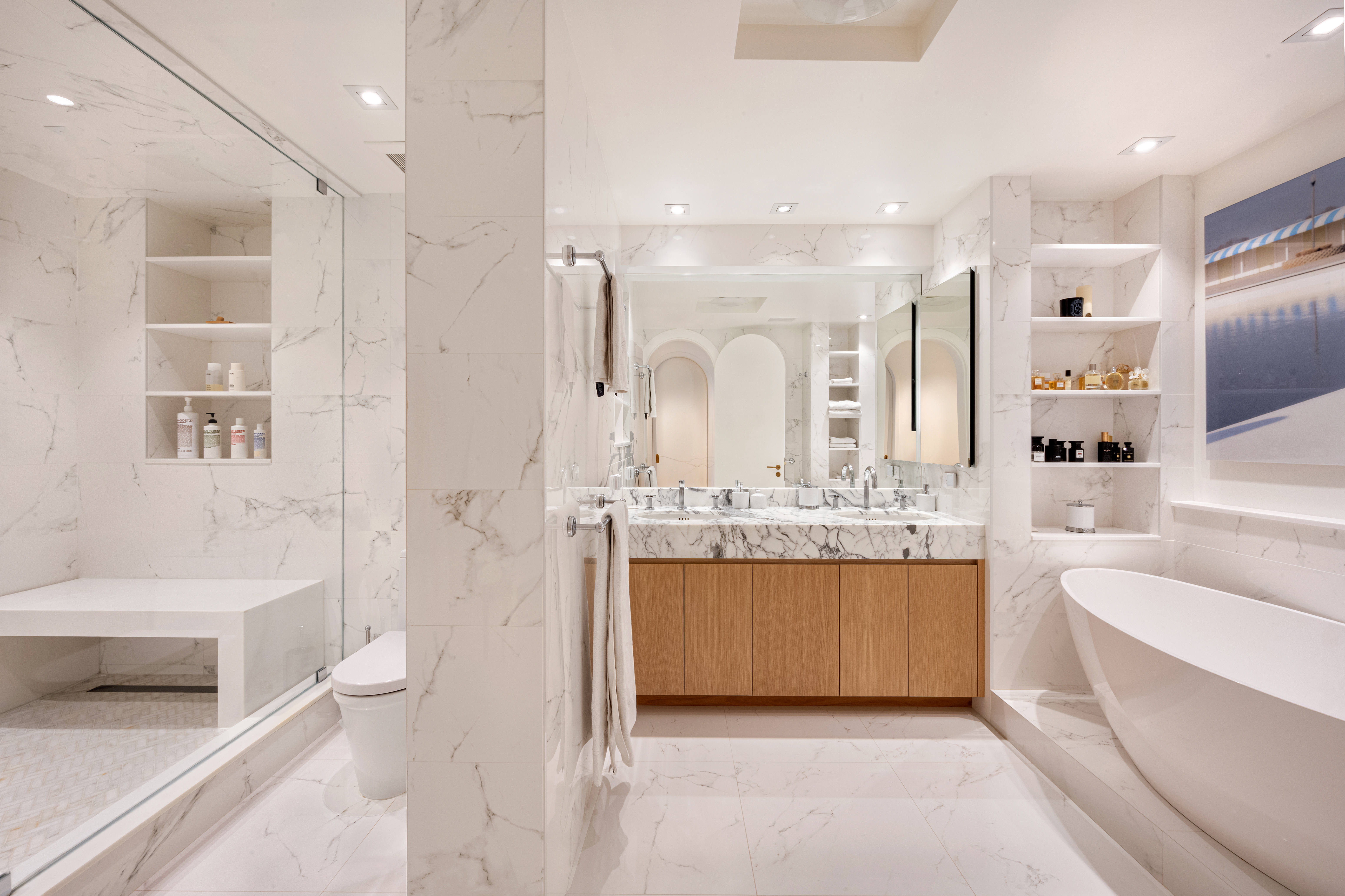 900 Park Avenue, Unit 7ABCE Manhattan, NY 10075 - Photo 9 of 18 a bathroom with a granite countertop sink a toilet and bathtub