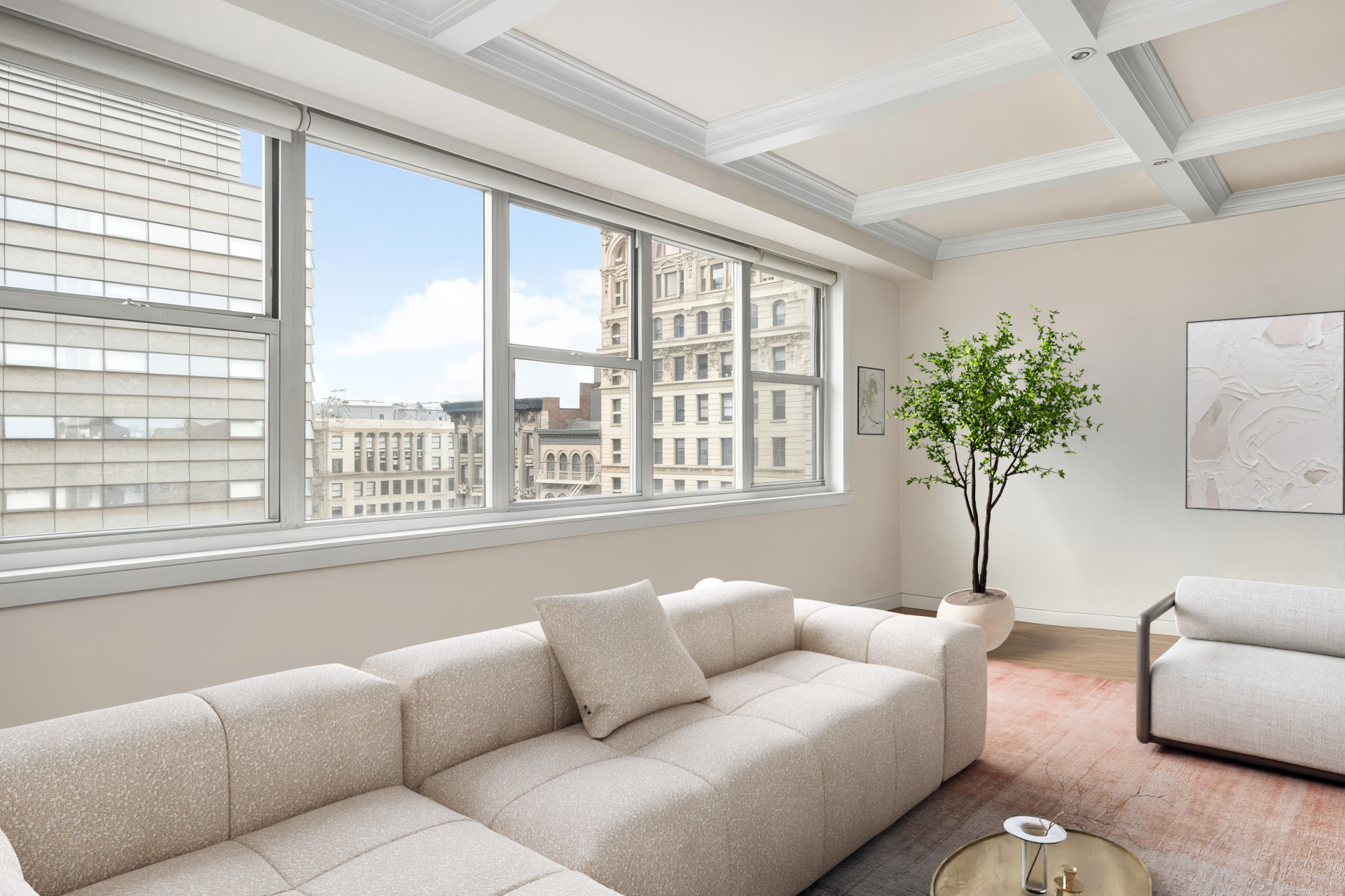 69 5th Avenue, Unit 17HJ Manhattan, NY 10003 - Photo 2 of 10 a living room with furniture and a large window with garden view