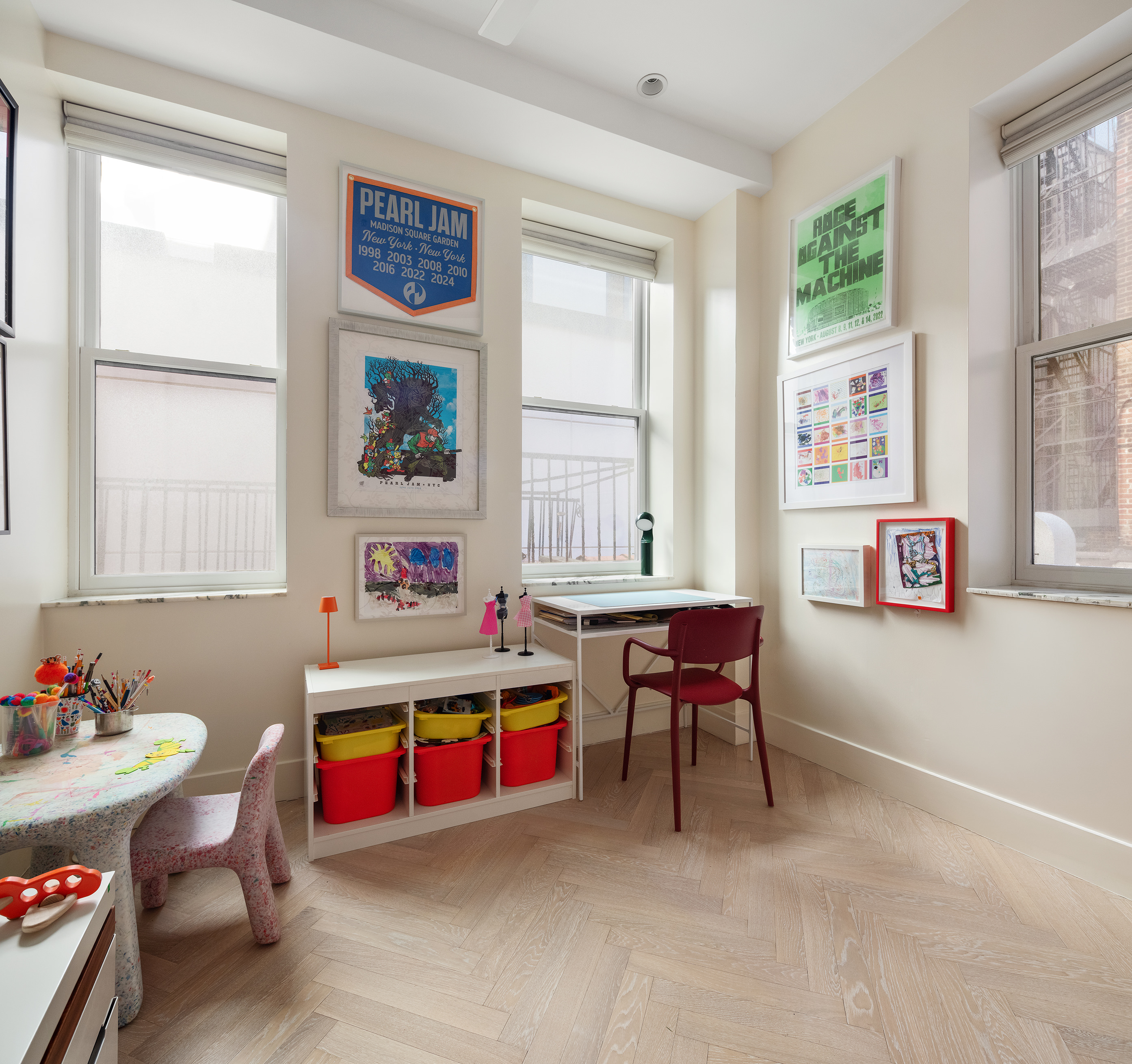 143 West 27th Street, Unit 2R Manhattan, NY 10001 - Photo 10 of 13 a living room with furniture and window