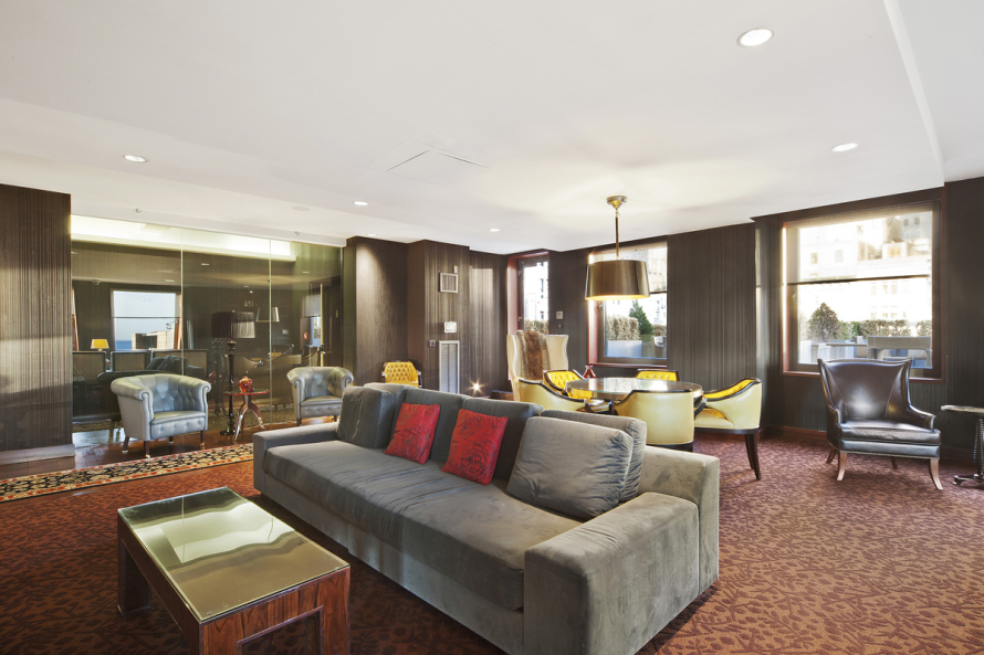 88 Greenwich Street, Unit 2903 Manhattan, NY 10006 - Photo 10 of 13 a living room with furniture and a large window