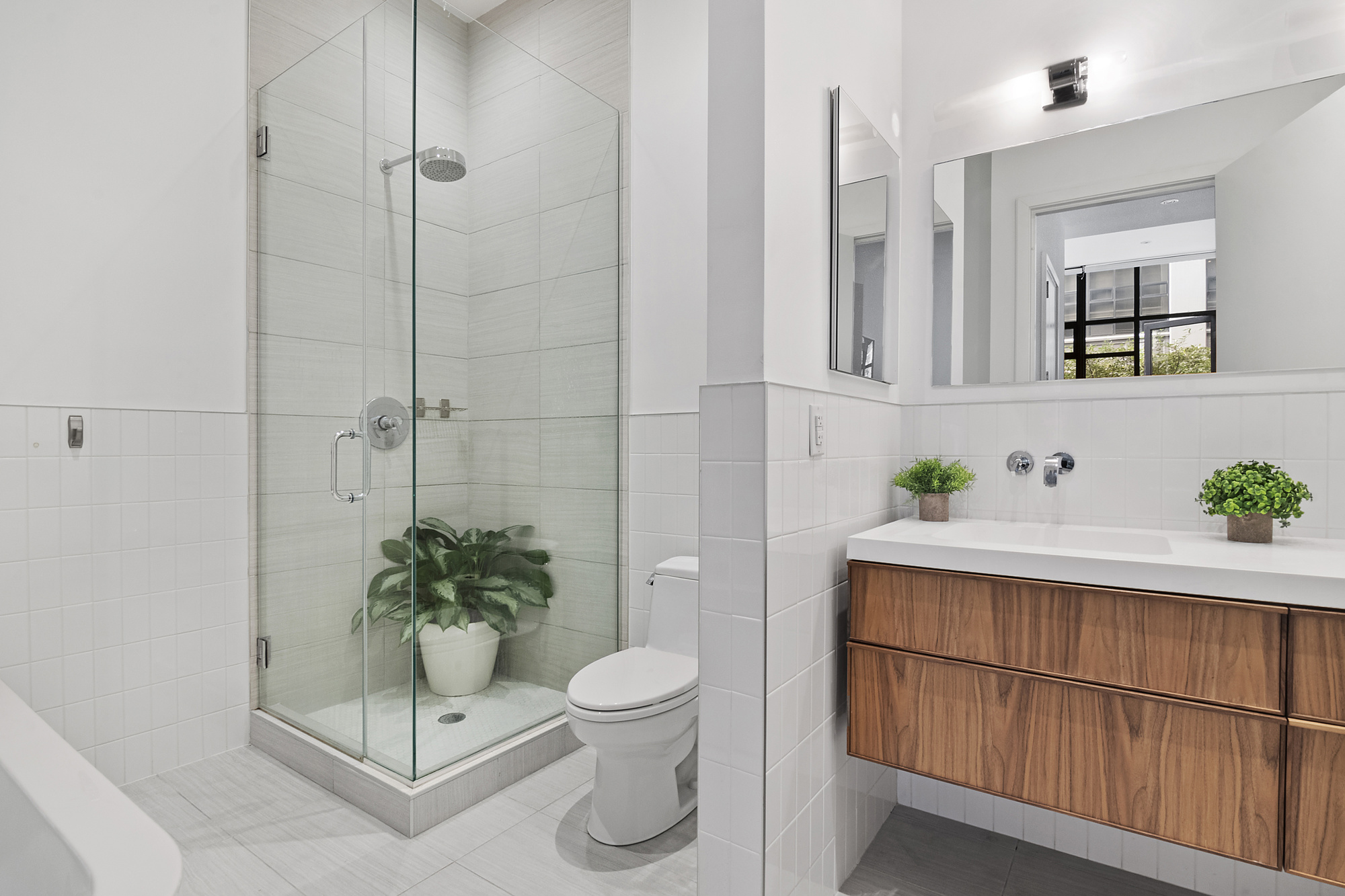 360 Furman Street, Unit 320/321 Brooklyn, NY 11201 - Photo 11 of 28 a bathroom with a sink and toilet