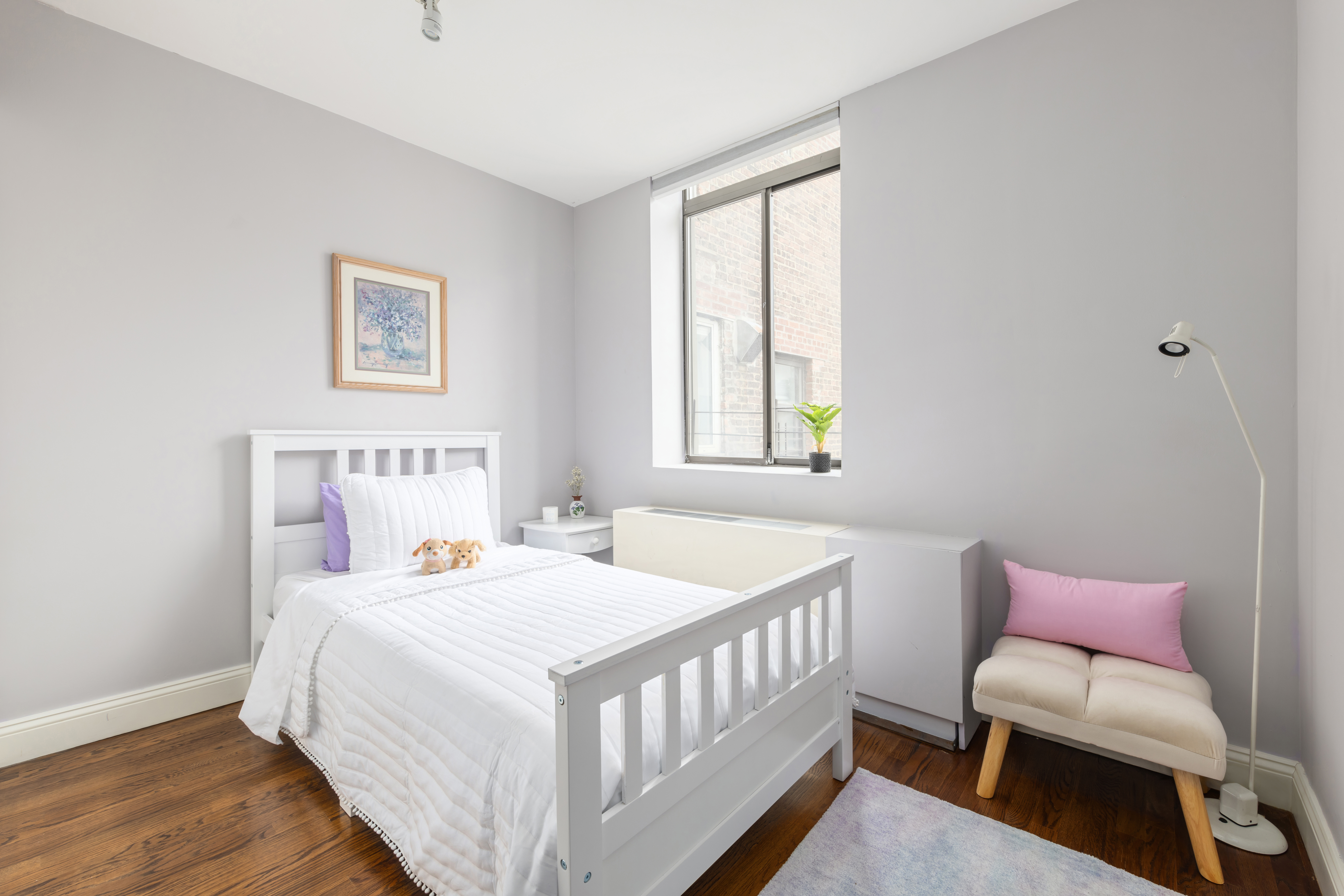 99 Reade Street, Unit 5E Manhattan, NY 10013 - Photo 10 of 13 a bedroom with a bed and a window