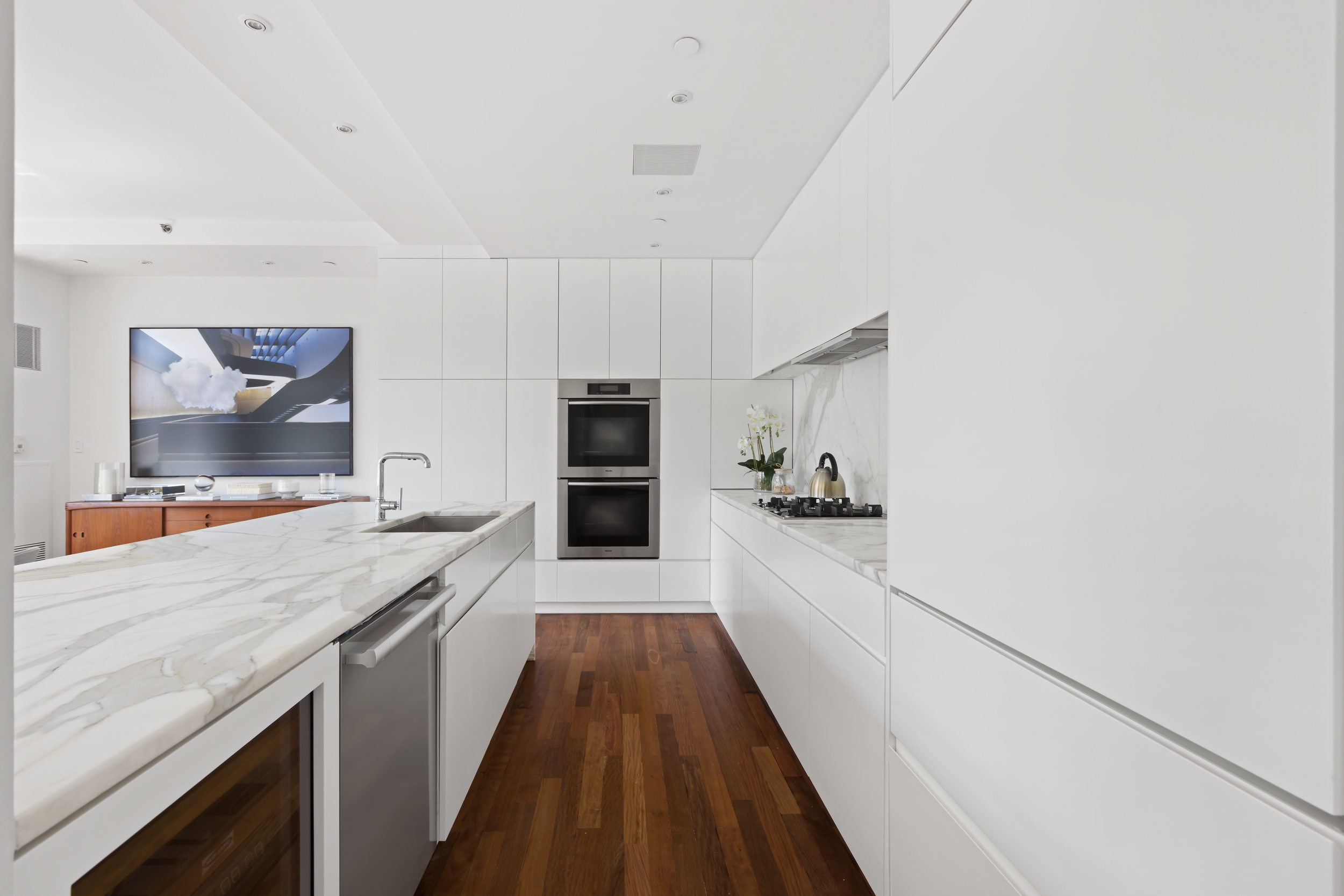 744 Greenwich Street, Unit 4 Manhattan, NY 10014 - Photo 13 of 34 a large kitchen with a stove and refrigerator