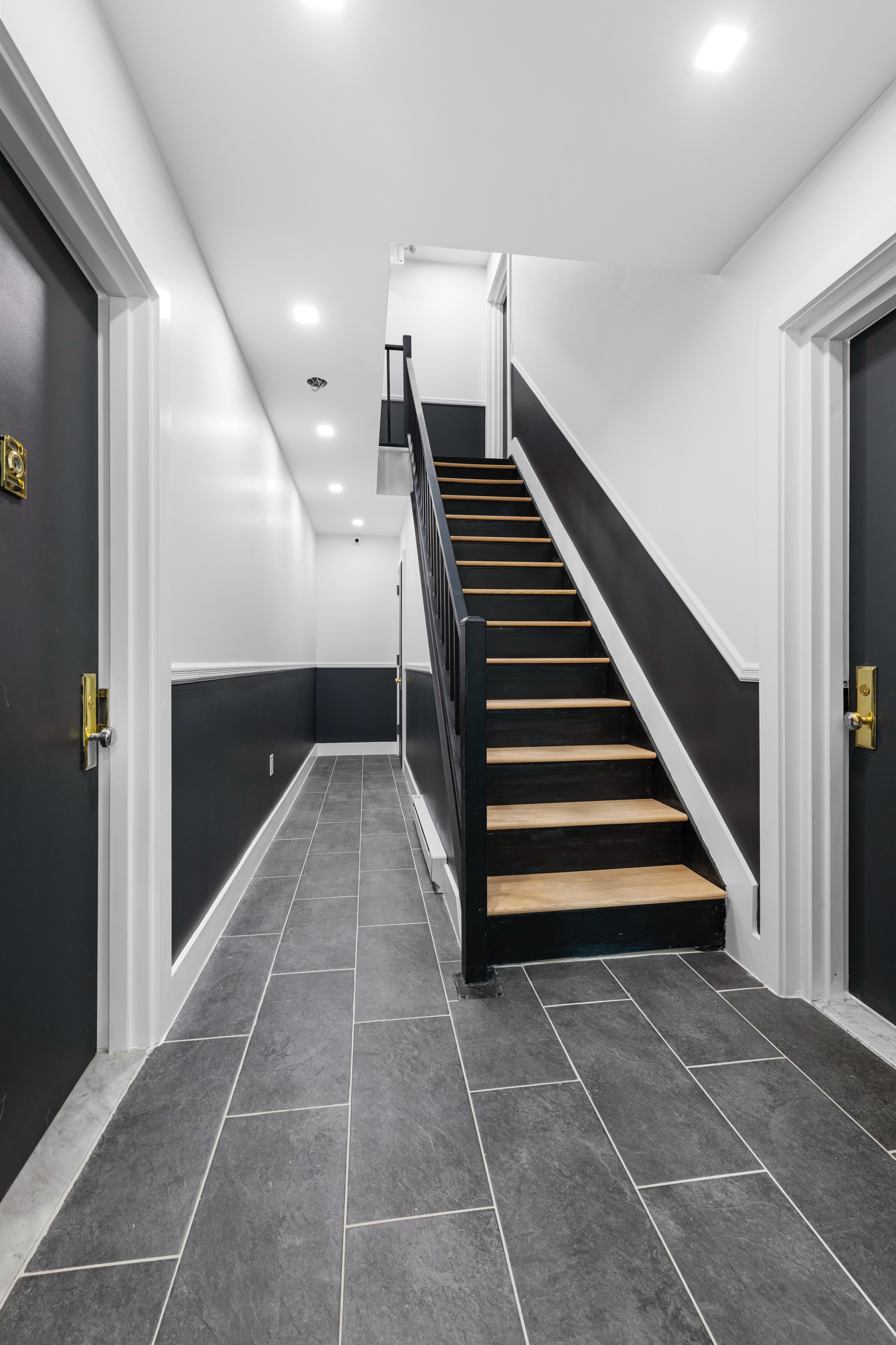 34-32 43rd Street, Unit 2L Queens, NY 11101 - Photo 1 of 1 a view of entryway and hall with wooden floor