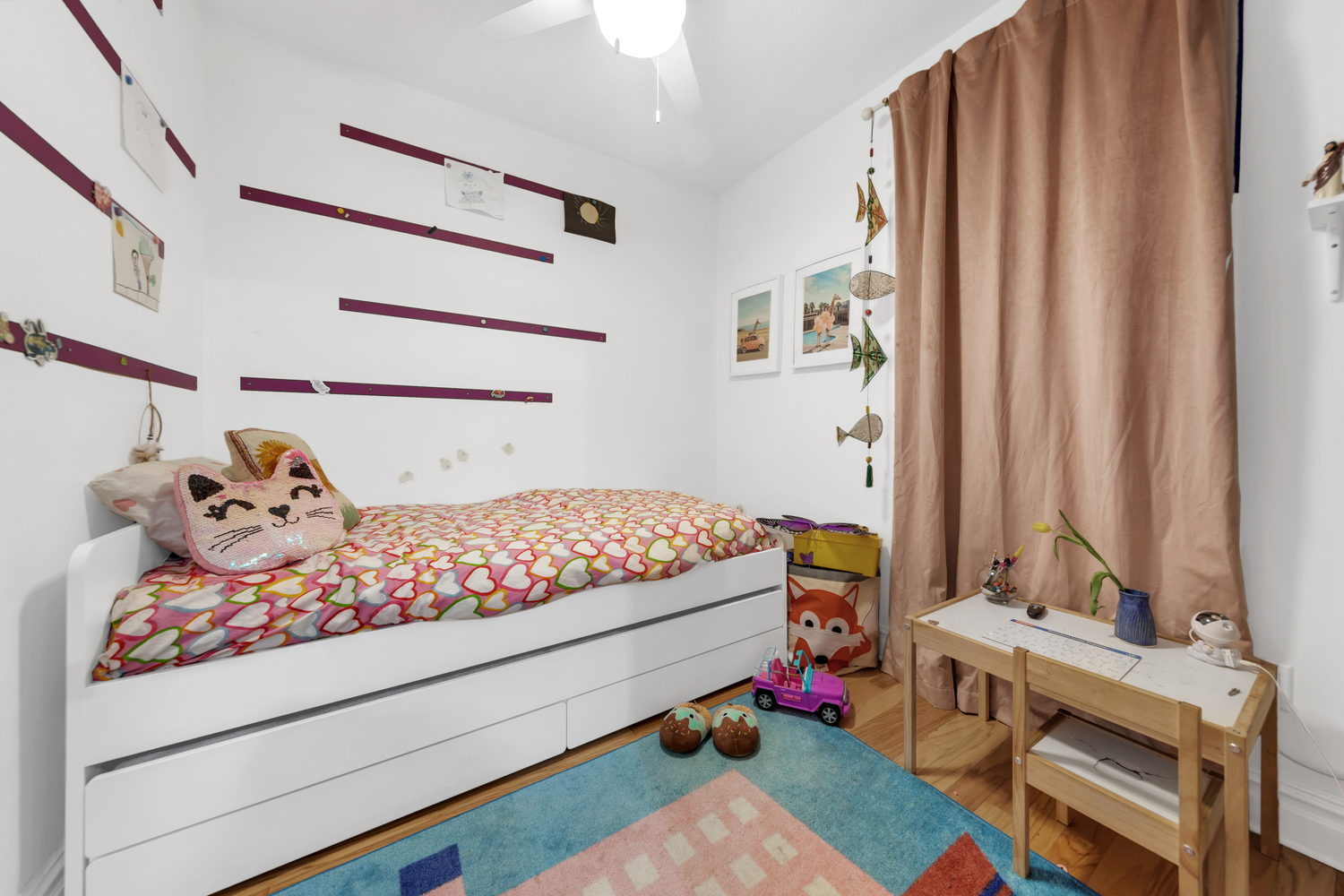 385 Argyle Road, Unit 1B Brooklyn, NY 11218 - Photo 8 of 11 a bedroom with a bed and a window