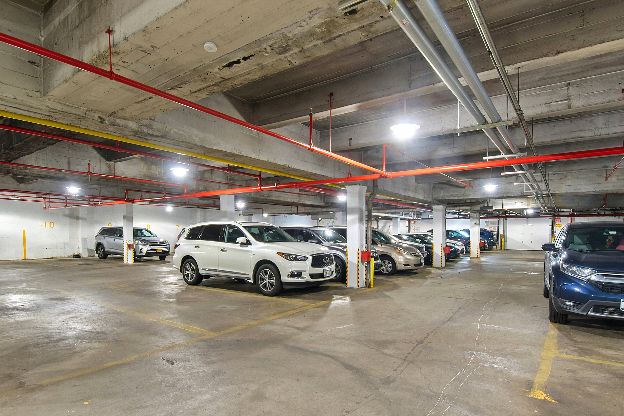 601 Kappock Street, Unit 6F Bronx, NY 10463 - Photo 21 of 31 a view of parking garage with cars