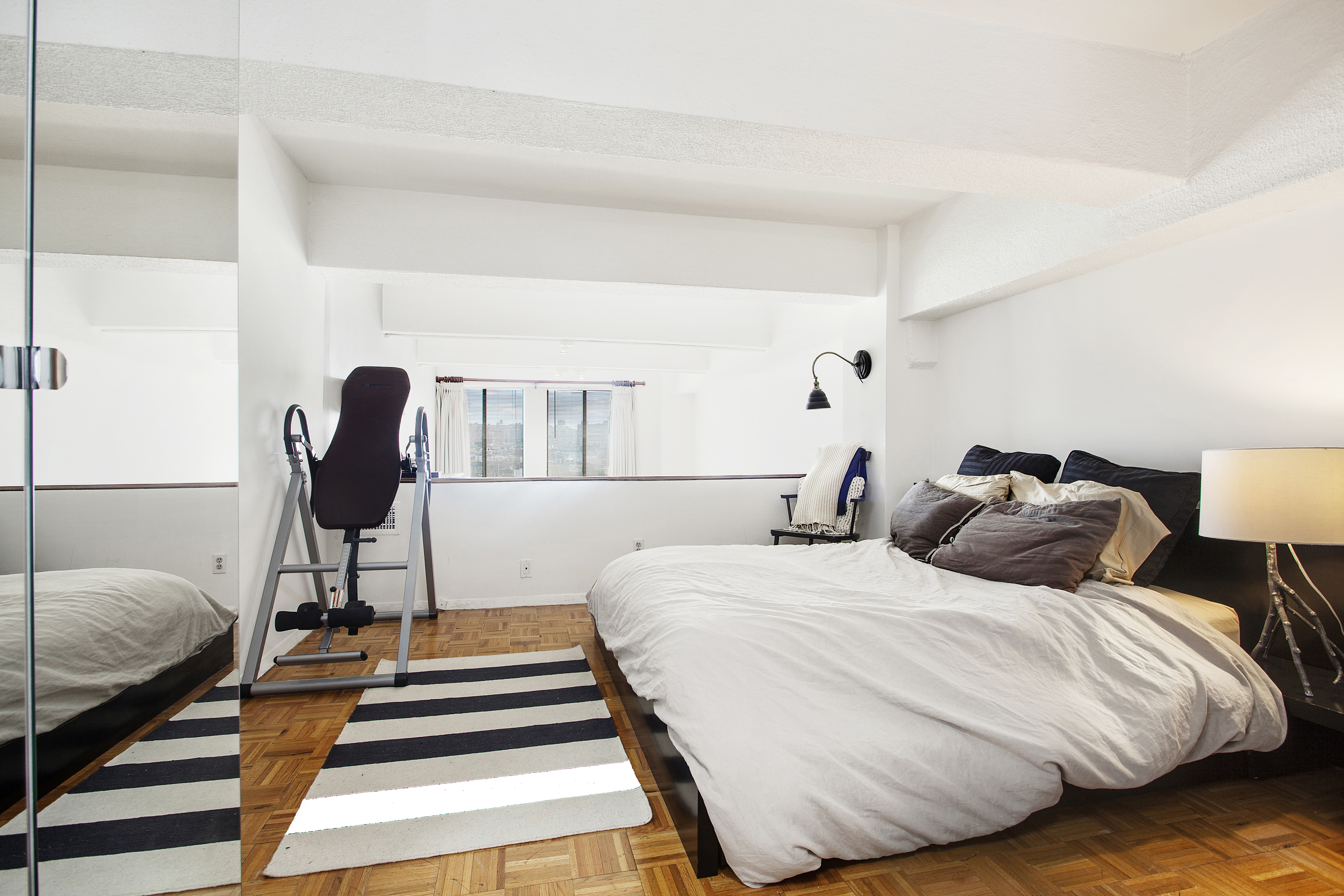 421 Hudson Street, Unit 508 Manhattan, NY 10014 - Photo 3 of 5 a bedroom with double bed and a window