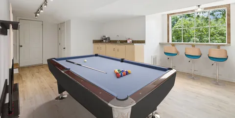 a white stove sitting inside of a kitchen