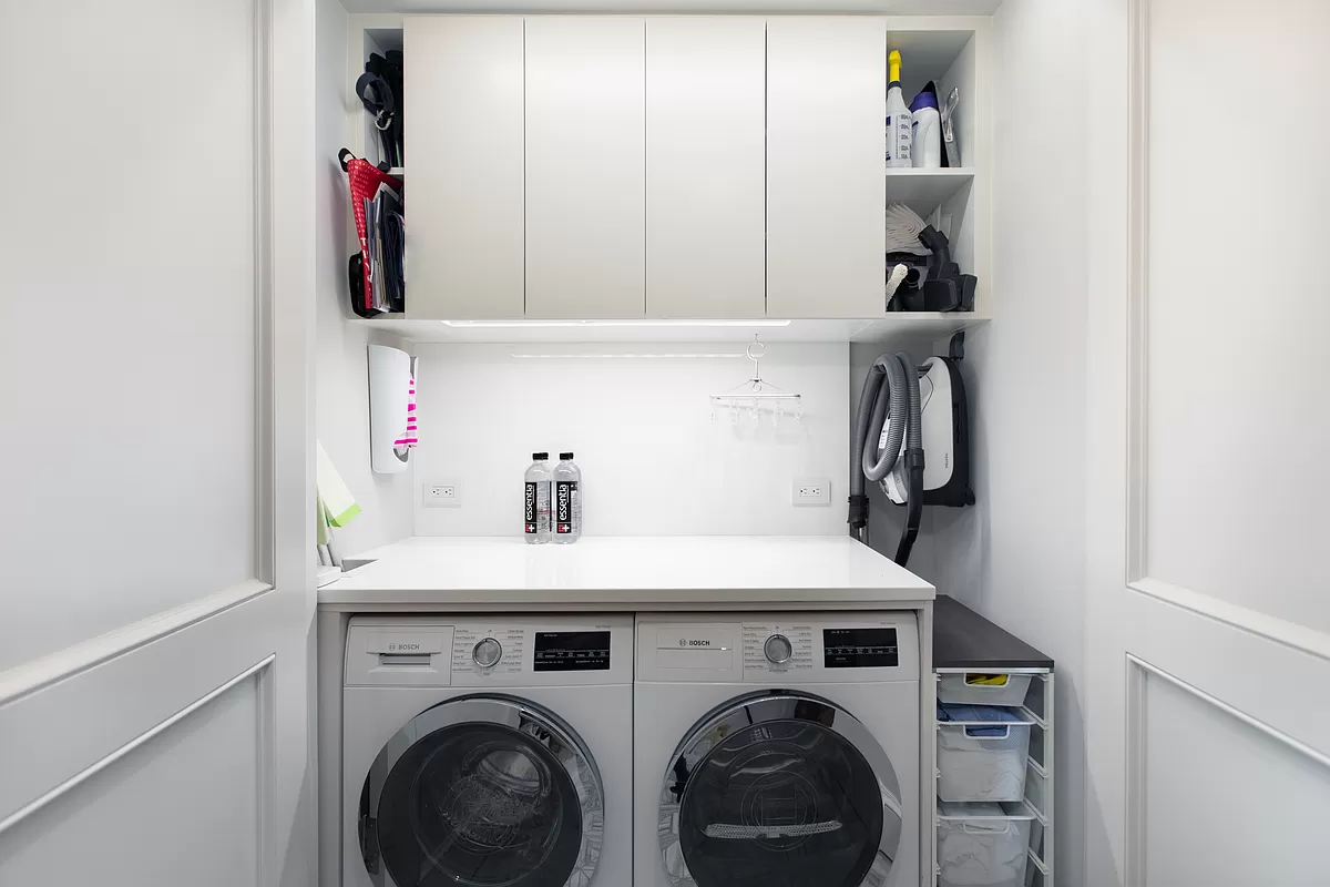 390 West End Avenue, Unit 7DS Manhattan, NY 10024 - Photo 15 of 31 a utility room with dryer and washer