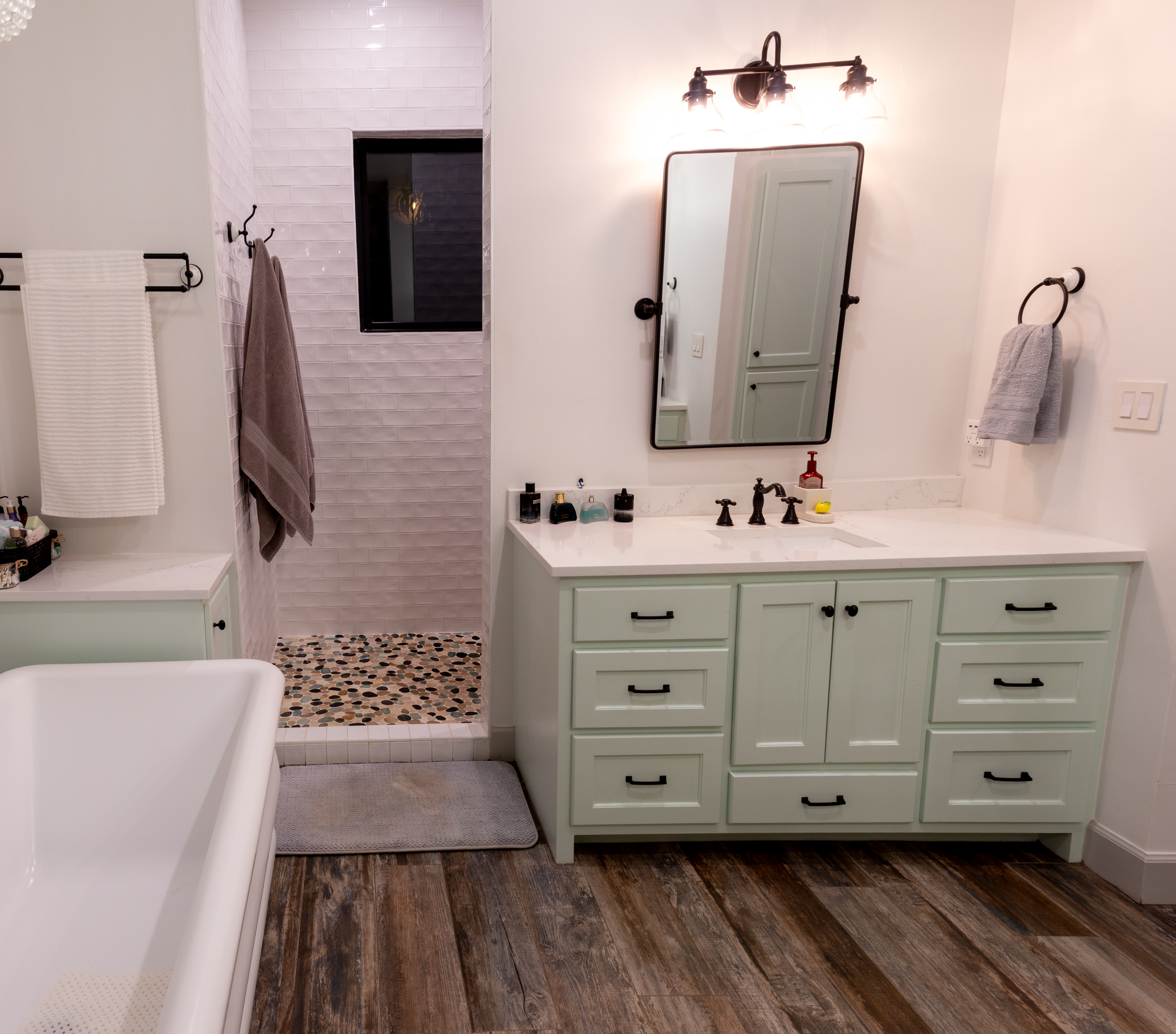 272 Slate Rock Road Willow City, TX 78675 - Photo 20 of 30 a bathroom with a double vanity sink mirror and