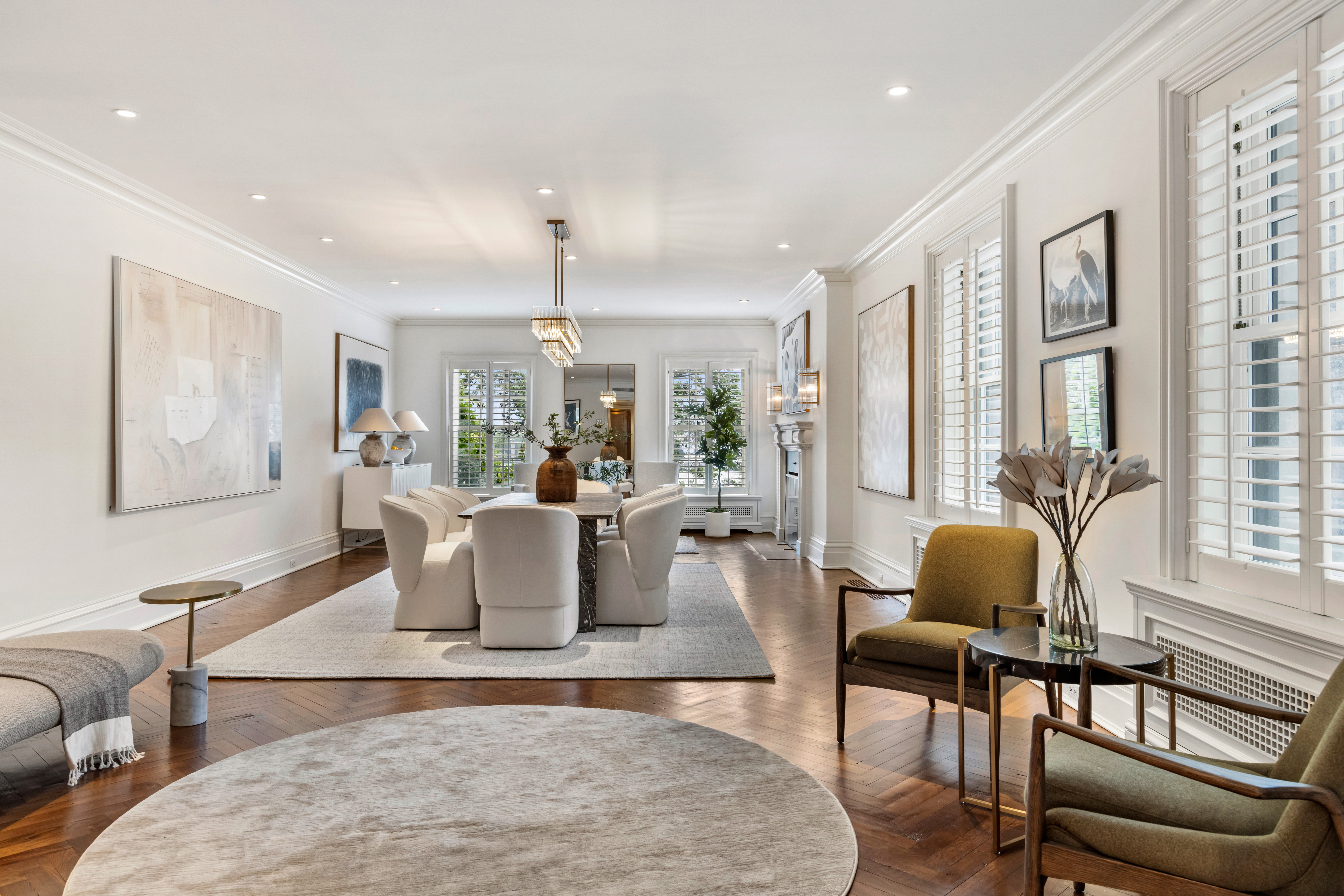 21 Beekman Place Manhattan, NY 10022 - Photo 7 of 16 a living room with furniture and large windows