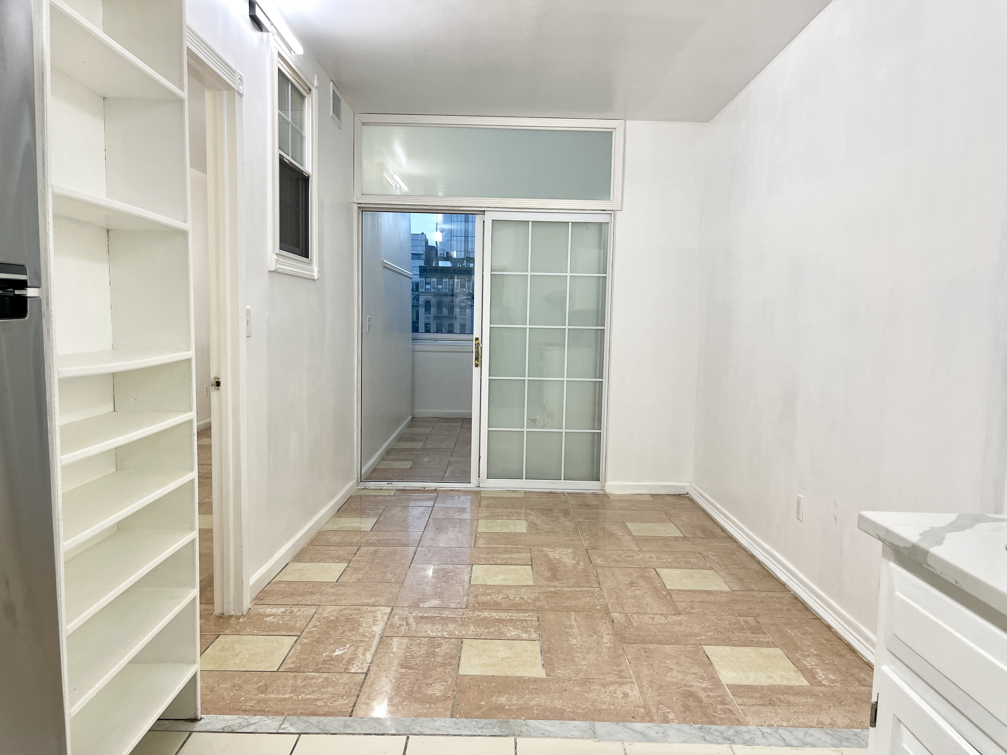 148A Madison Street, Unit 4 Manhattan, NY 10002 - Photo 6 of 13 a view of hallway with walk in closet and window
