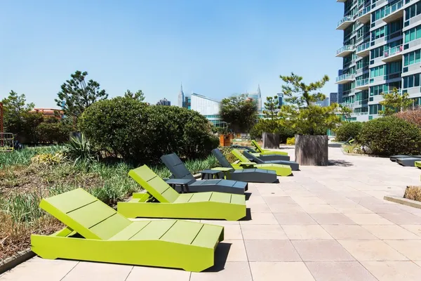 a view of a swimming pool with a patio