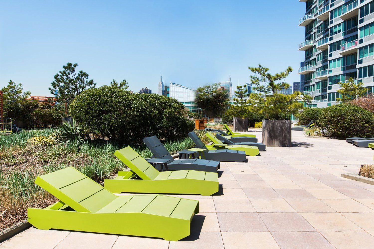 46-30 Center Boulevard, Unit 406 Queens, NY 11109 - Photo 19 of 24 a view of a swimming pool with a patio