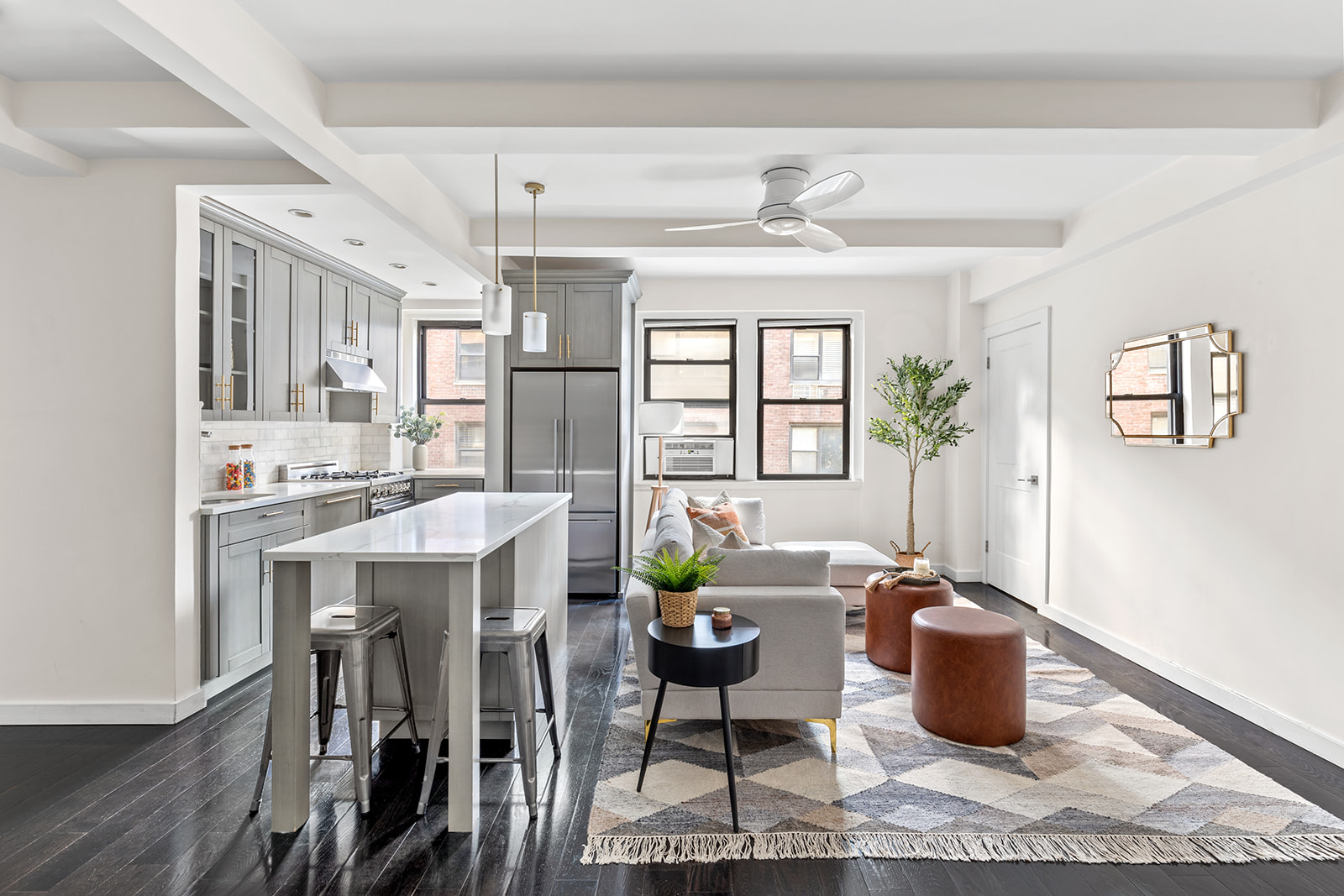 211 East 35th Street, Unit 4D Manhattan, NY 10016 - Photo 3 of 6 a living room with furniture and a dining table