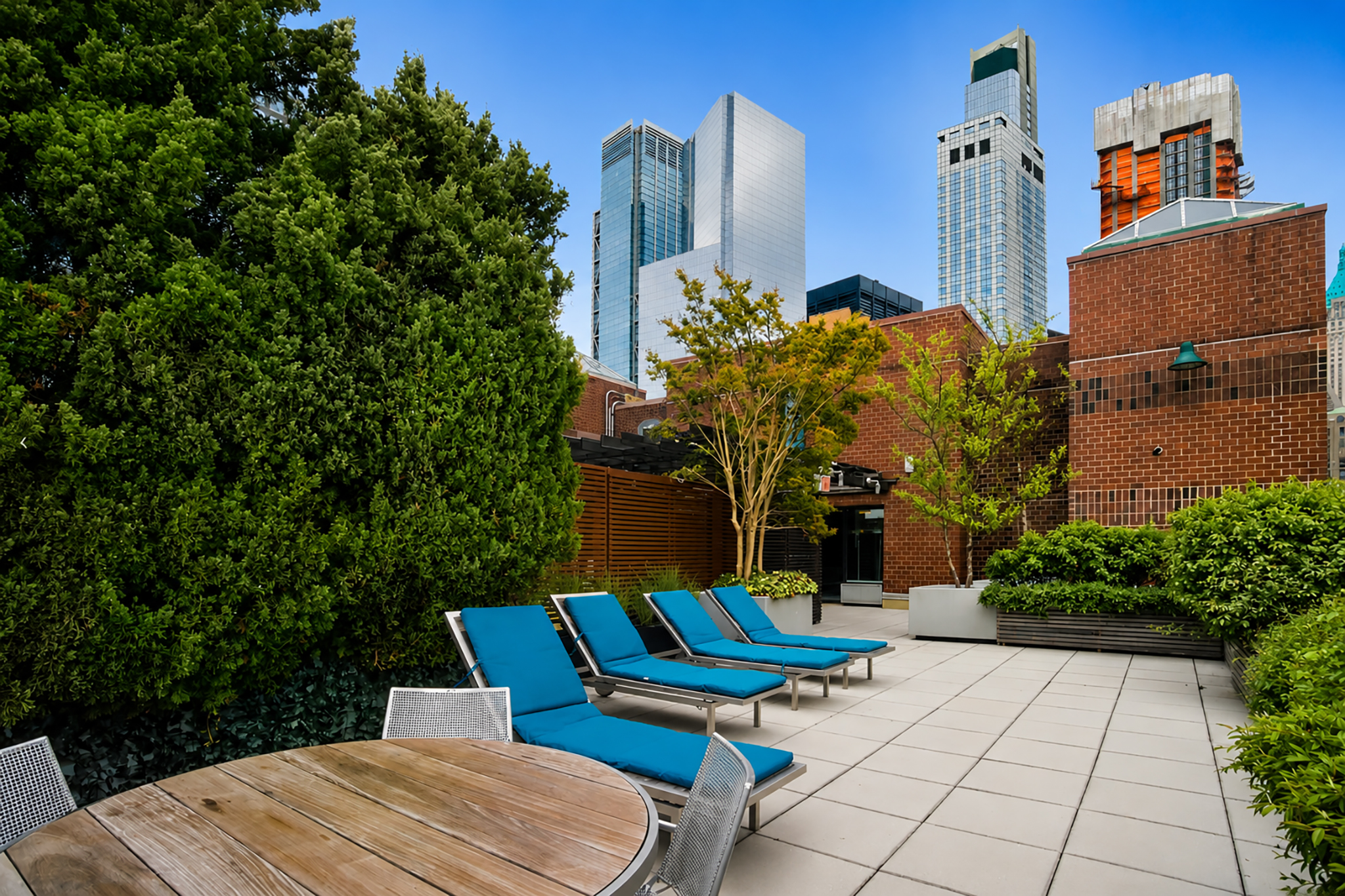 225 Rector Place, Unit 9T Manhattan, NY 10280 - Photo 11 of 15 a view of a outdoor space with seating area