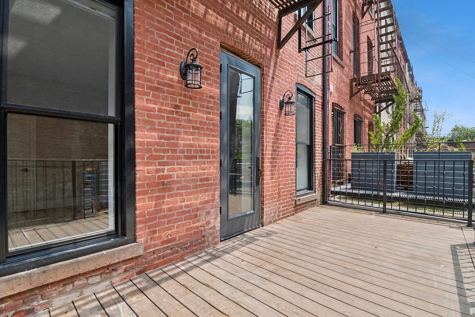 264 Stuyvesant Avenue, Unit 2 Brooklyn, NY 11221 - Photo 2 of 9 a view of a brick house with many windows
