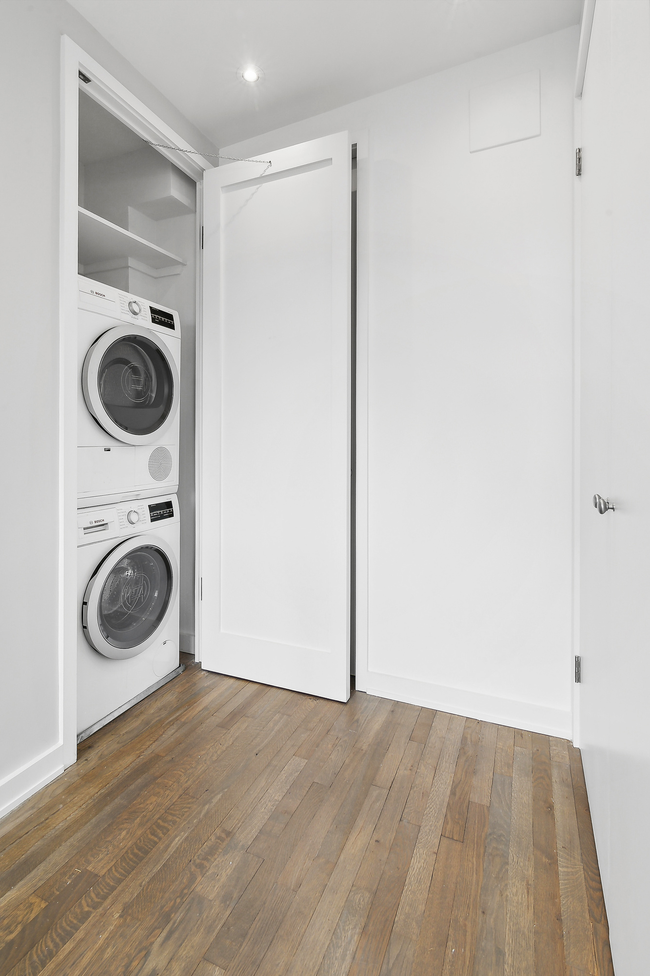 350 West 14th Street, Unit PHB Manhattan, NY 10014 - Photo 10 of 15 a view of a storage and utility room with a washer and dryer