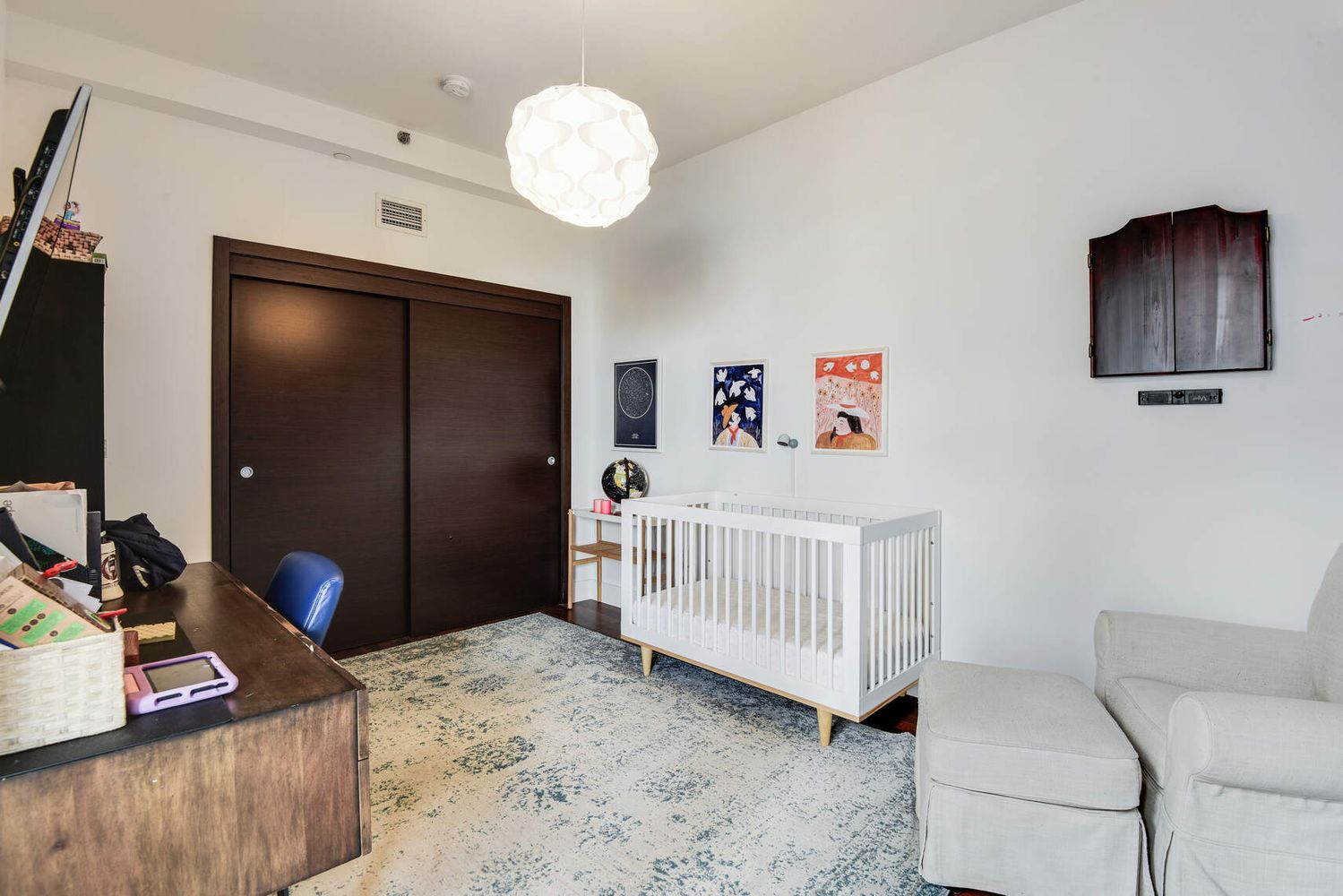 150 Myrtle Avenue, Unit PH3201 Brooklyn, NY 11201 - Photo 12 of 40 a bedroom with a bed and a chair