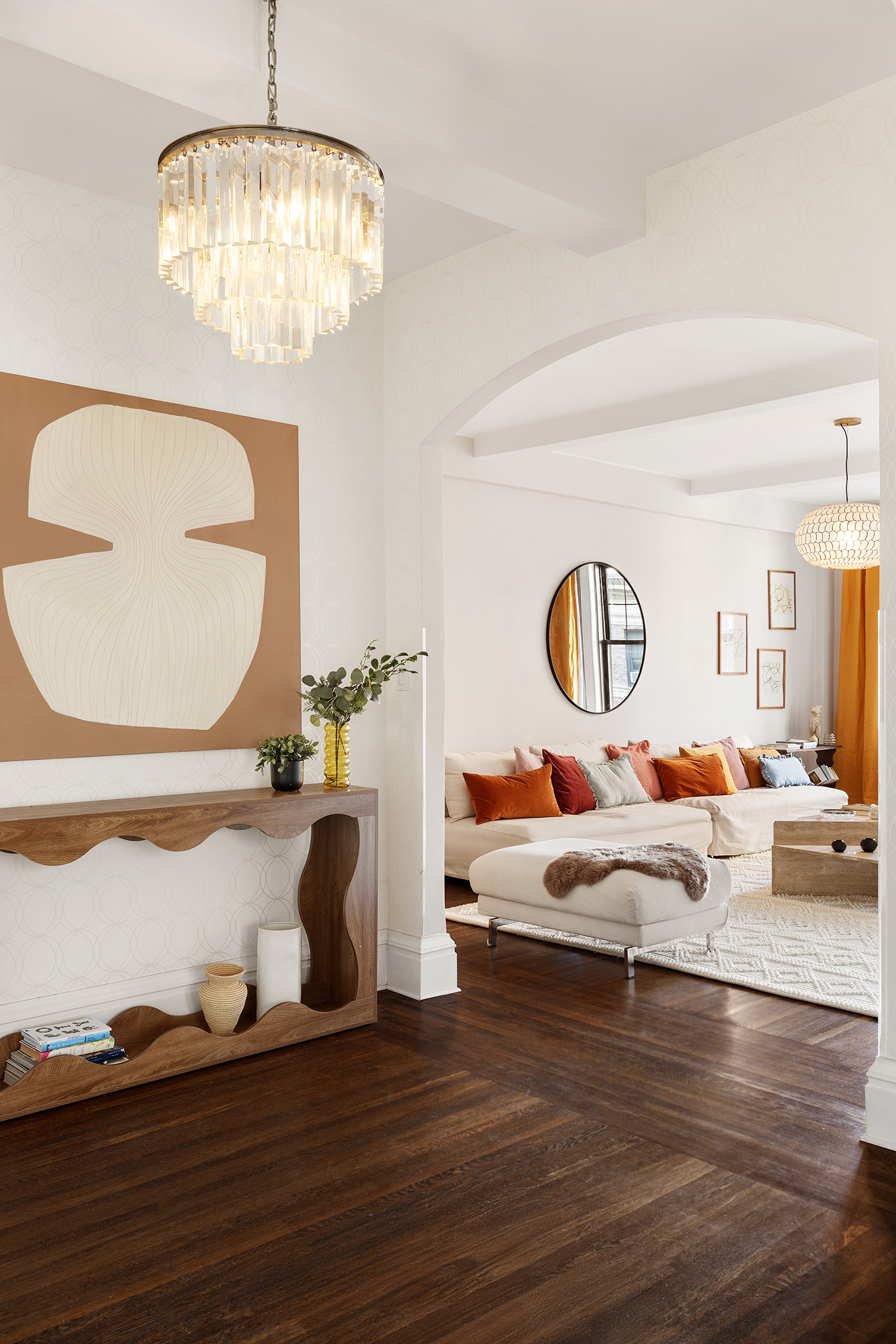 24 West 69th Street, Unit 9A Manhattan, NY 10023 - Photo 2 of 14 a living room with furniture and a chandelier