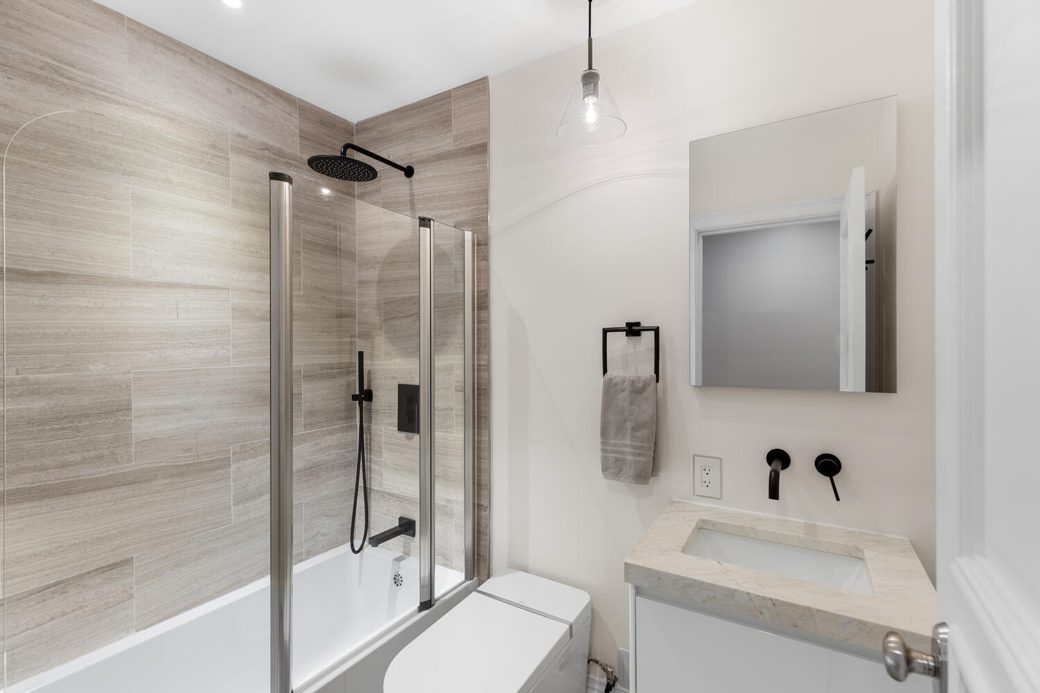 160 Commonwealth Avenue, Unit 410 Boston, MA 02116 - Photo 18 of 31 a bathroom with a sink toilet and shower