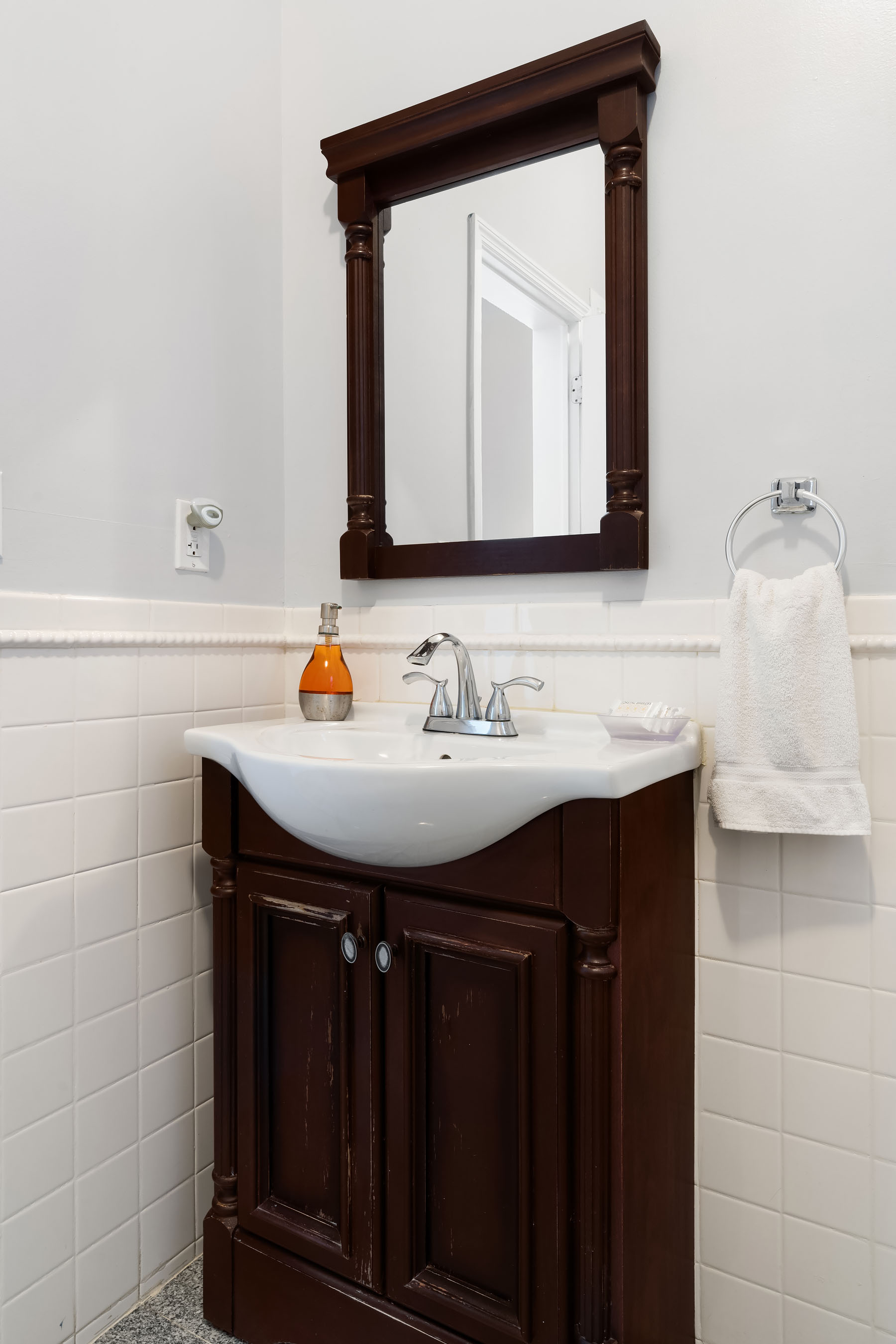 469 West 140th Street, Unit 2 Manhattan, NY 10031 - Photo 6 of 8 a bathroom with a sink and a mirror