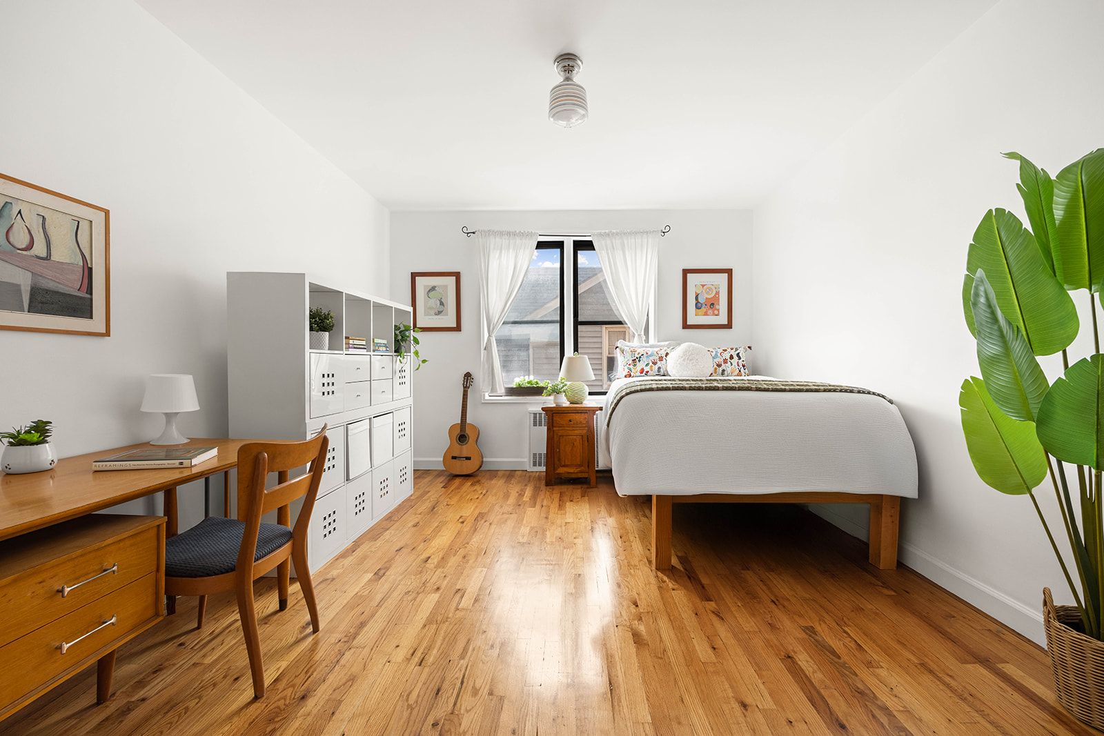 100 Ocean Parkway, Unit 3H Brooklyn, NY 11218 - Photo 4 of 11 a bedroom with furniture and a wooden floor