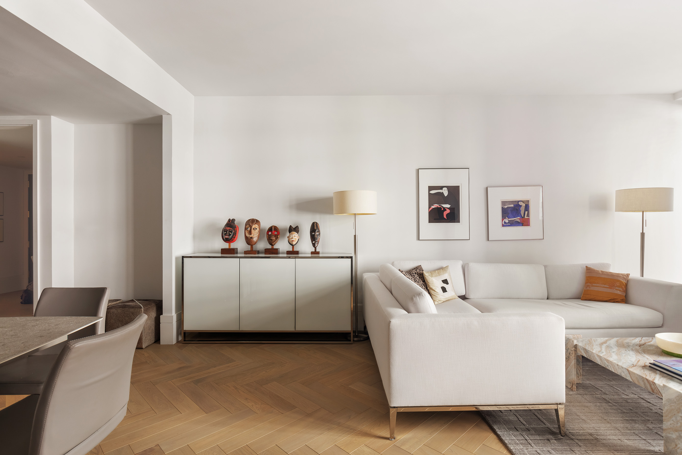 310 East 86th Street, Unit 4B Manhattan, NY 10028 - Photo 3 of 25 a living room with furniture and a couch