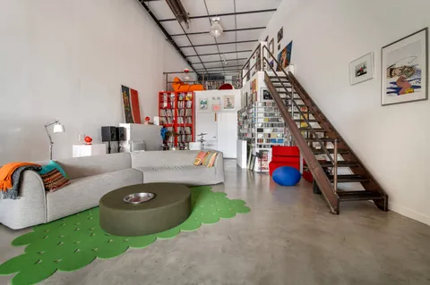 a view of play room with toys and toys