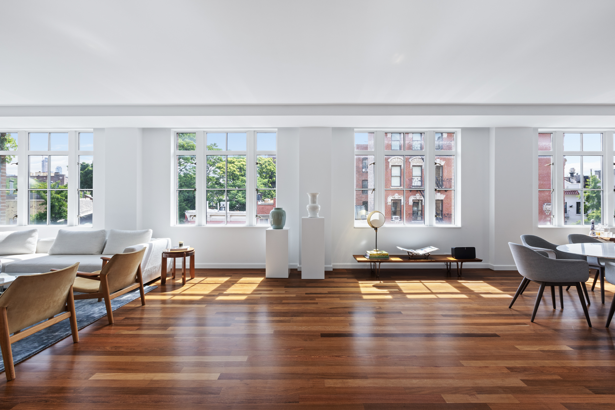 744 Greenwich Street, Unit 4 Manhattan, NY 10014 - Photo 8 of 34 a living room with furniture and wooden floor