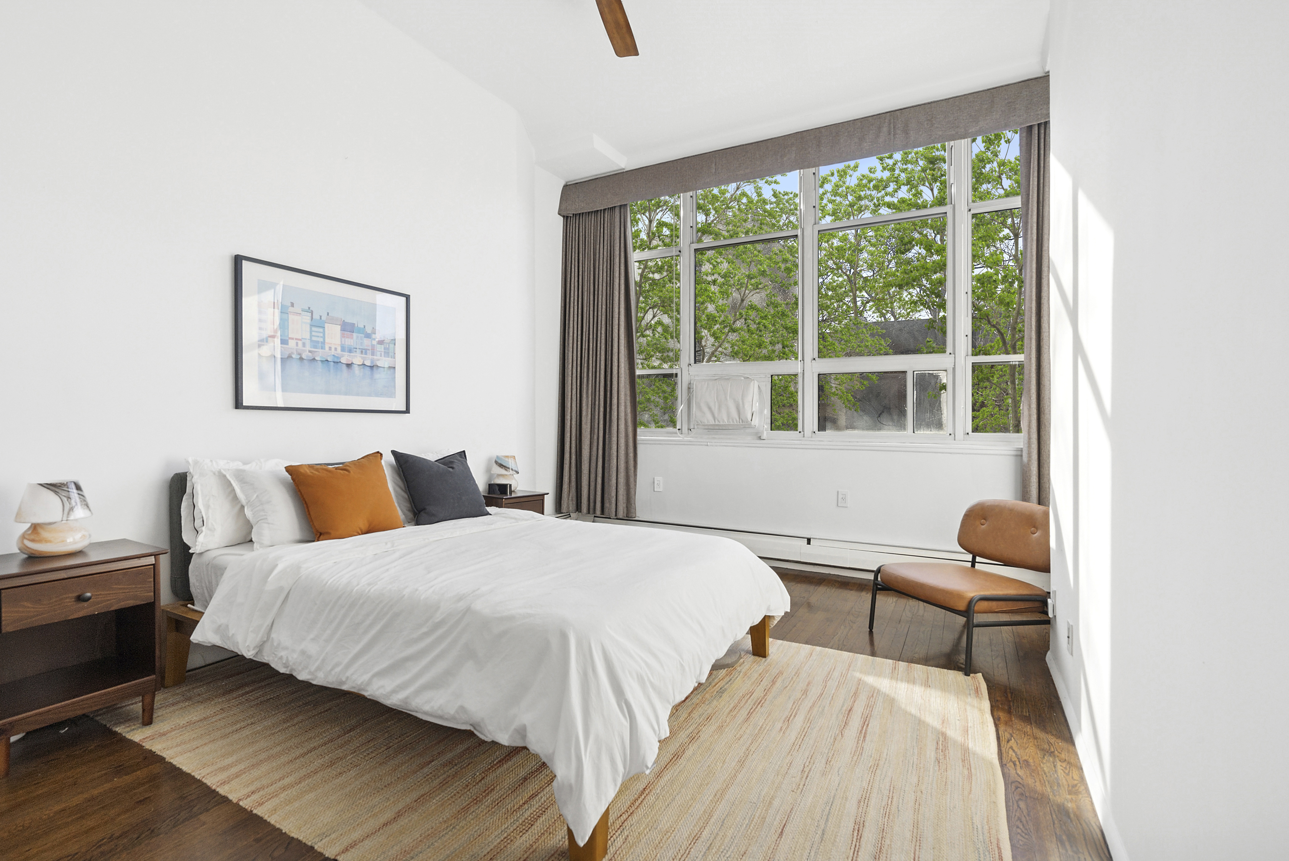 505 Court Street, Unit 3D Brooklyn, NY 11231 - Photo 4 of 14 a bedroom with a bed and wooden floor