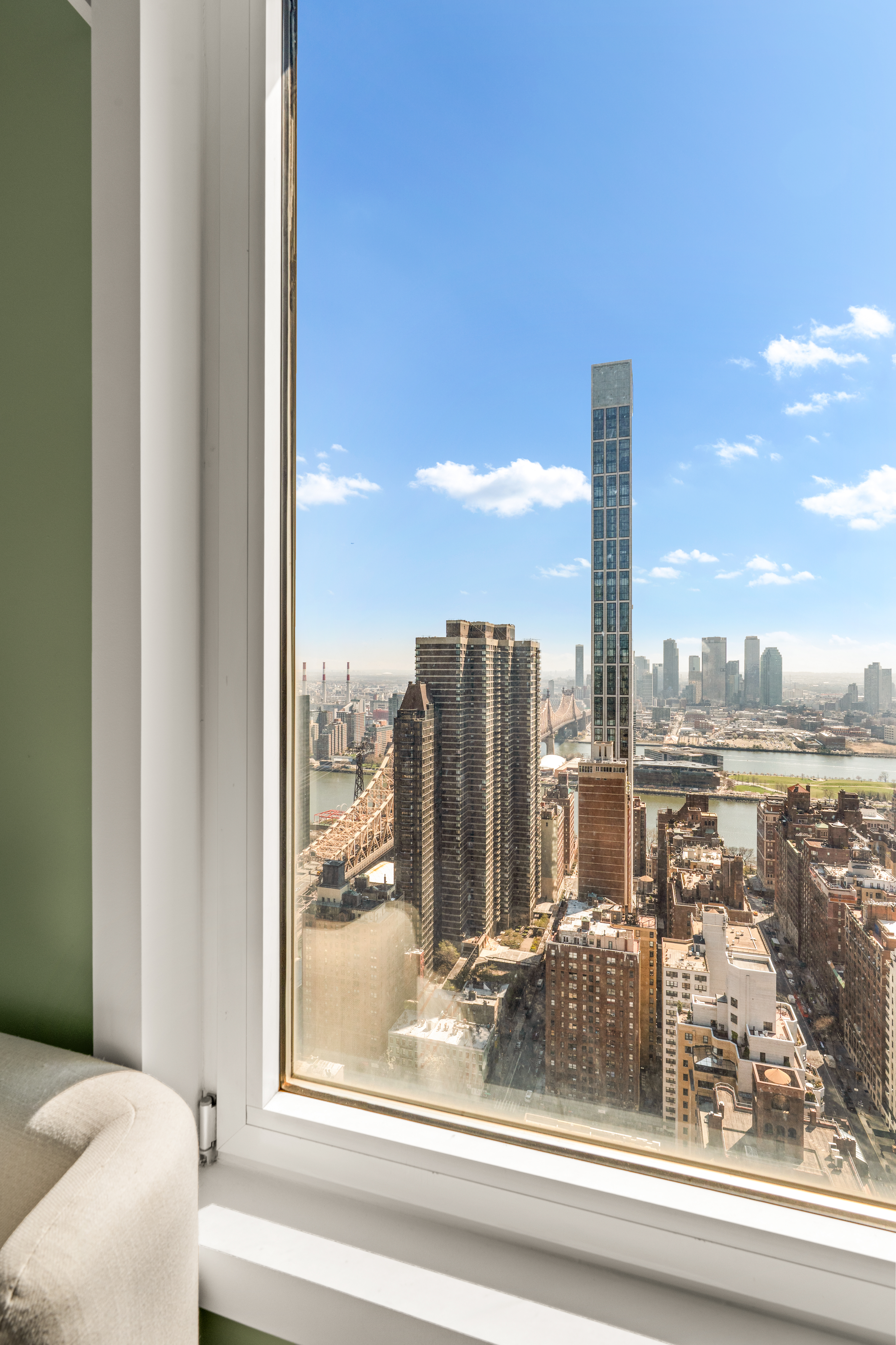303 East 57th Street, Unit 44G Manhattan, NY 10022 - Photo 13 of 19 a view of a city from a window