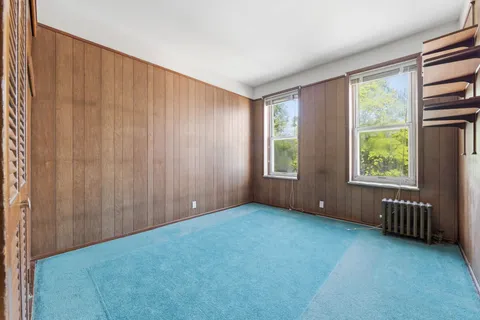 an empty room with windows