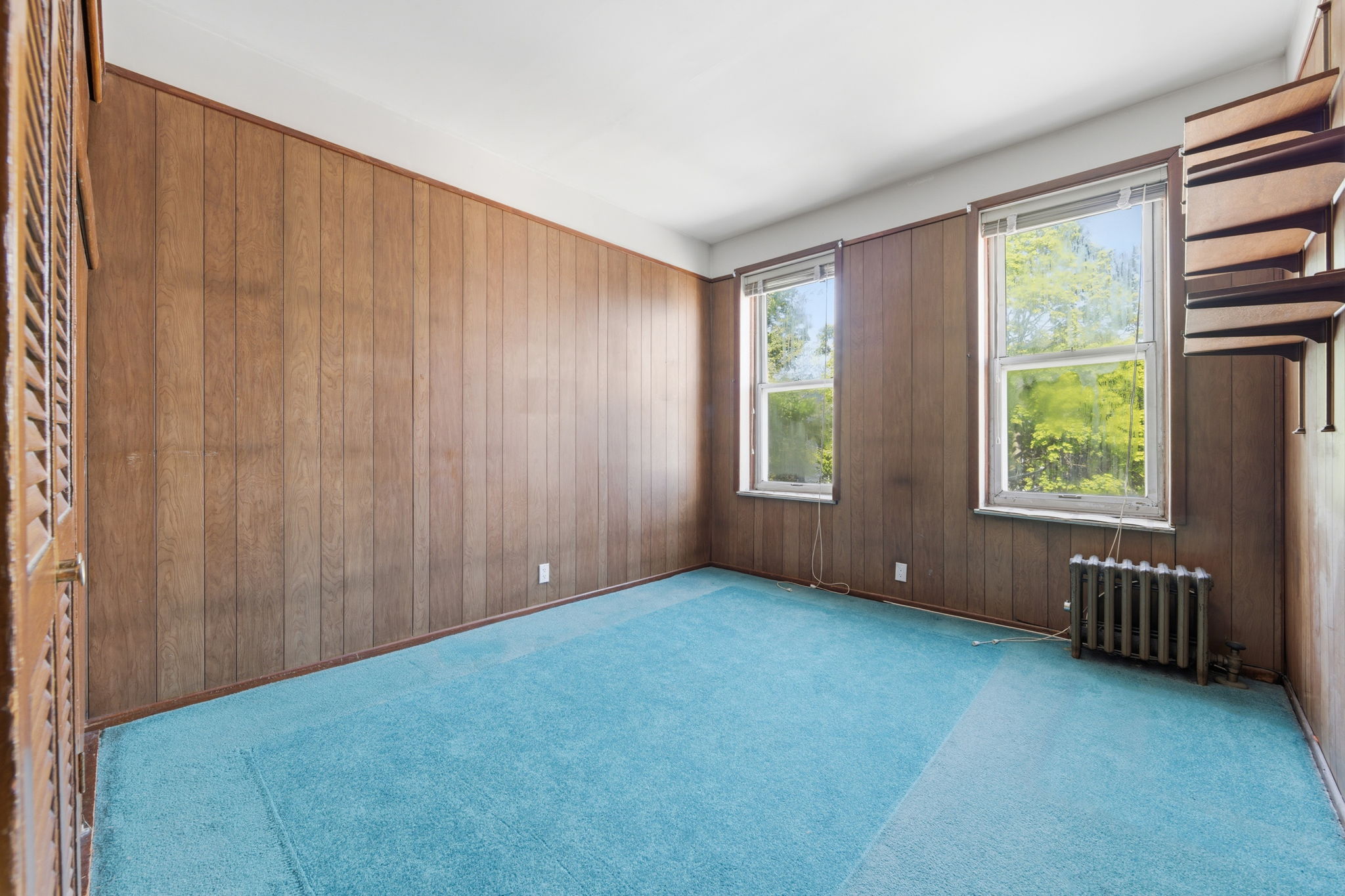 37 Chester Avenue Brooklyn, NY 11218 - Photo 11 of 14 an empty room with windows