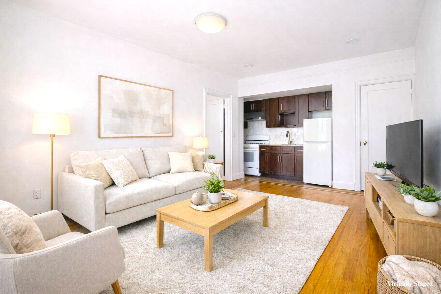63-20 Haring Street, Unit 2R Queens, NY 11374 - Photo 3 of 10 a living room with furniture and a flat screen tv