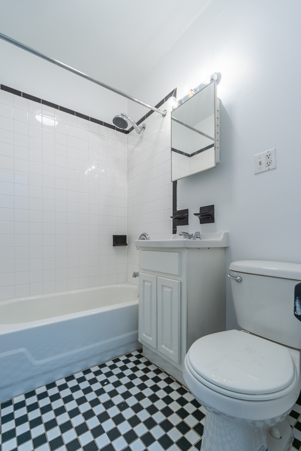 315 East 5th Street, Unit 1C Manhattan, NY 10003 - Photo 14 of 15 a bathroom with a sink a toilet and shower