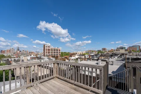 a view of a city from a roof deck