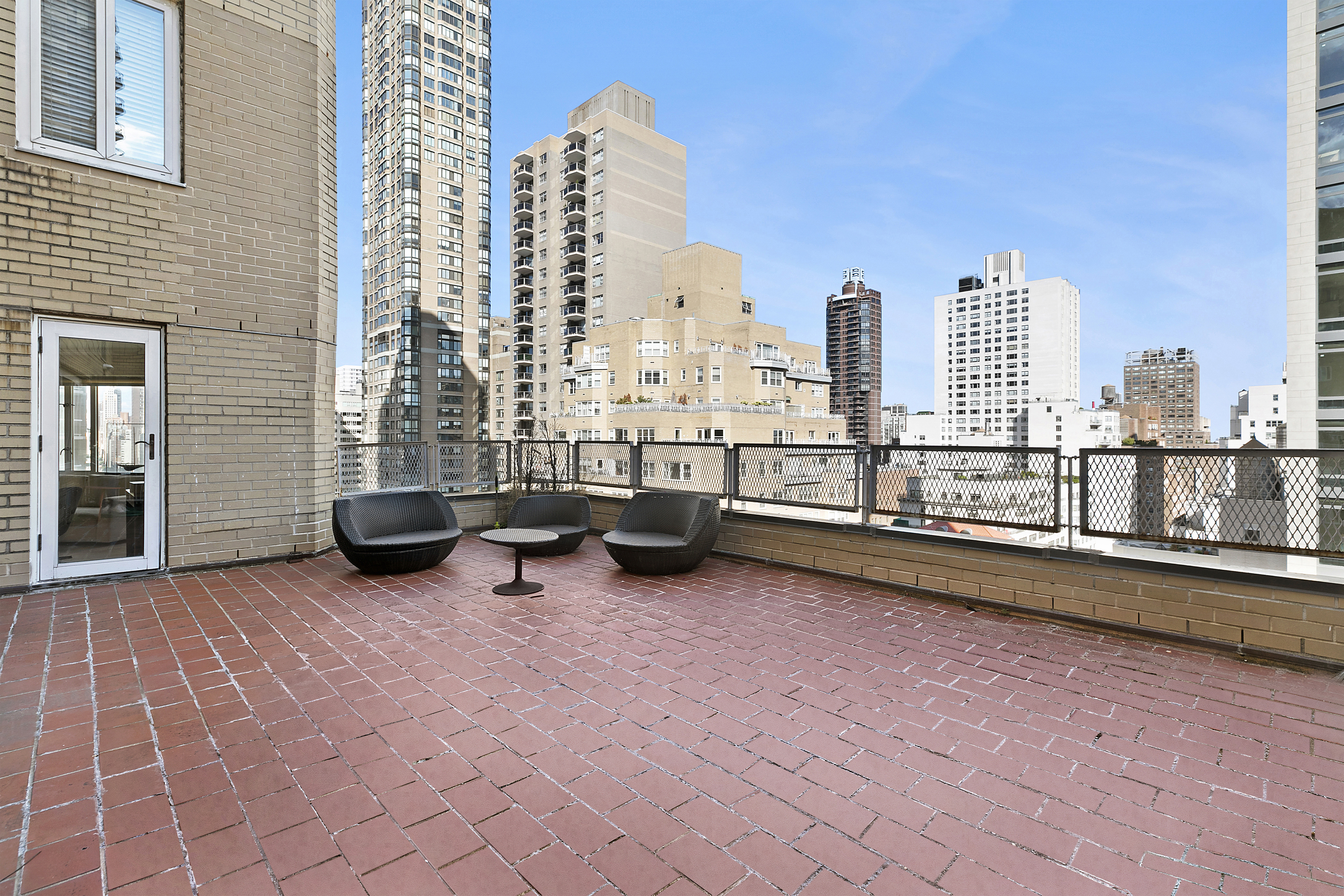 166 East 63rd Street, Unit 18B Manhattan, NY 10065 - Photo 9 of 12 a view of outdoor space with seating area